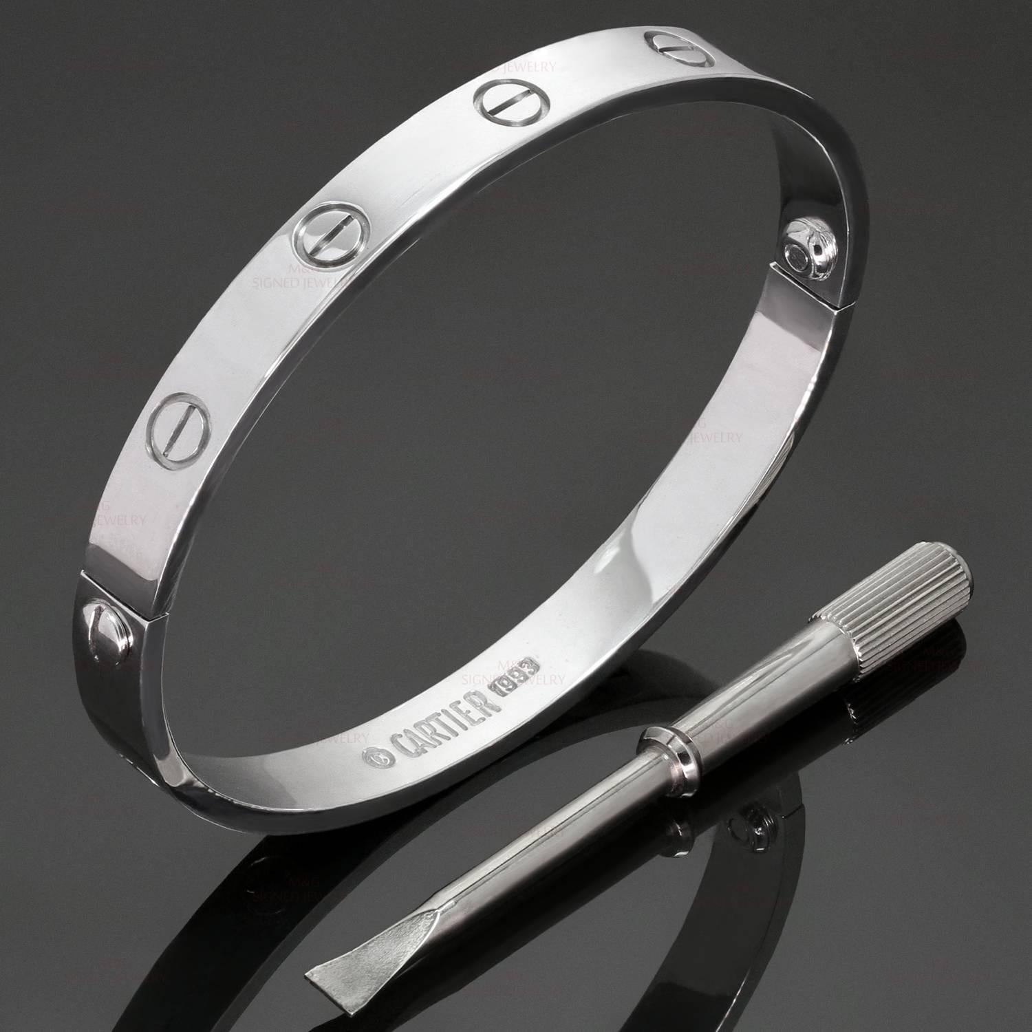 This iconic and timeless bracelet from Cartier's Love collection is finely crafted in 18k white gold and completed with the original Cartier screwdriver. This bangle is a size 17. Made in France circa 1993. Measurements: 0.23
