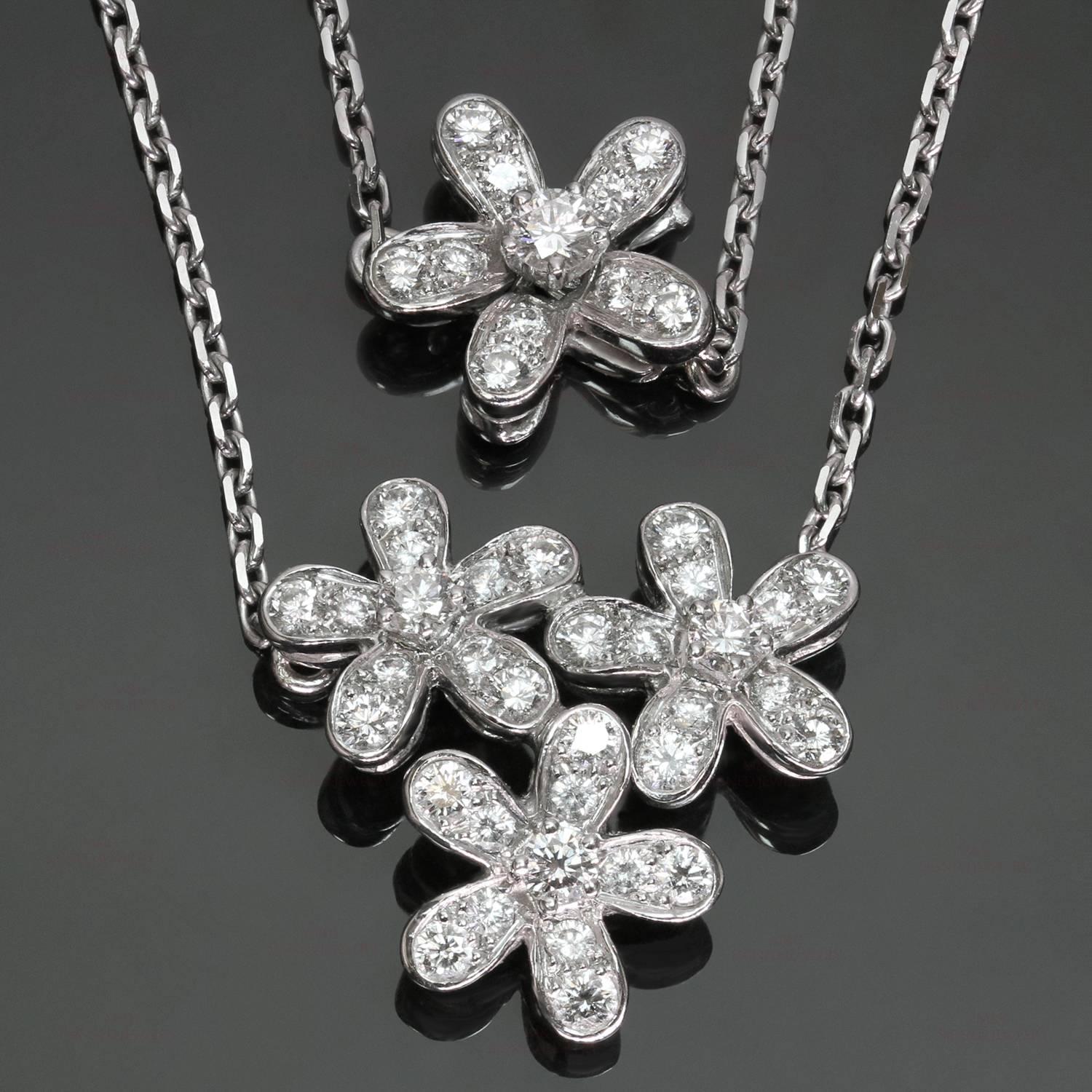 This stunning Van Cleef & Arpels necklace from the Socrate collection features a sparkling 3-flower pendant completed with a sparkling floral clasp, crafted in 18k white gold and set with brilliant-cut round diamonds of an estimated 0.91 carats,