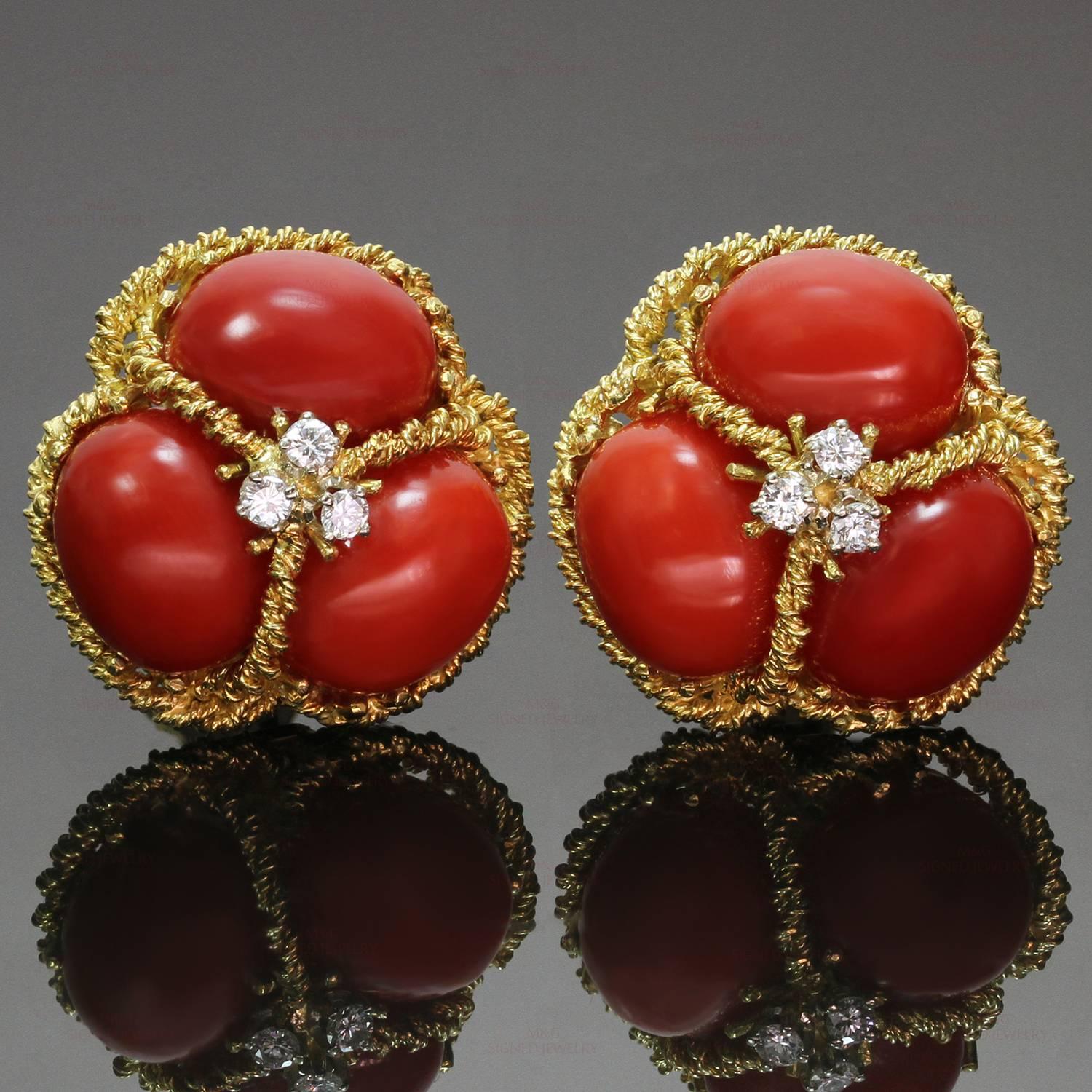 These gorgeous lever-back earrings feature an elegant rope-texture design crafted in 18k yellow gold and set with 6 natural oval cabochon oxblood corals each measuring about 11.90mm by 9.95mm and accented with 6 brilliant-cut round diamonds weighing