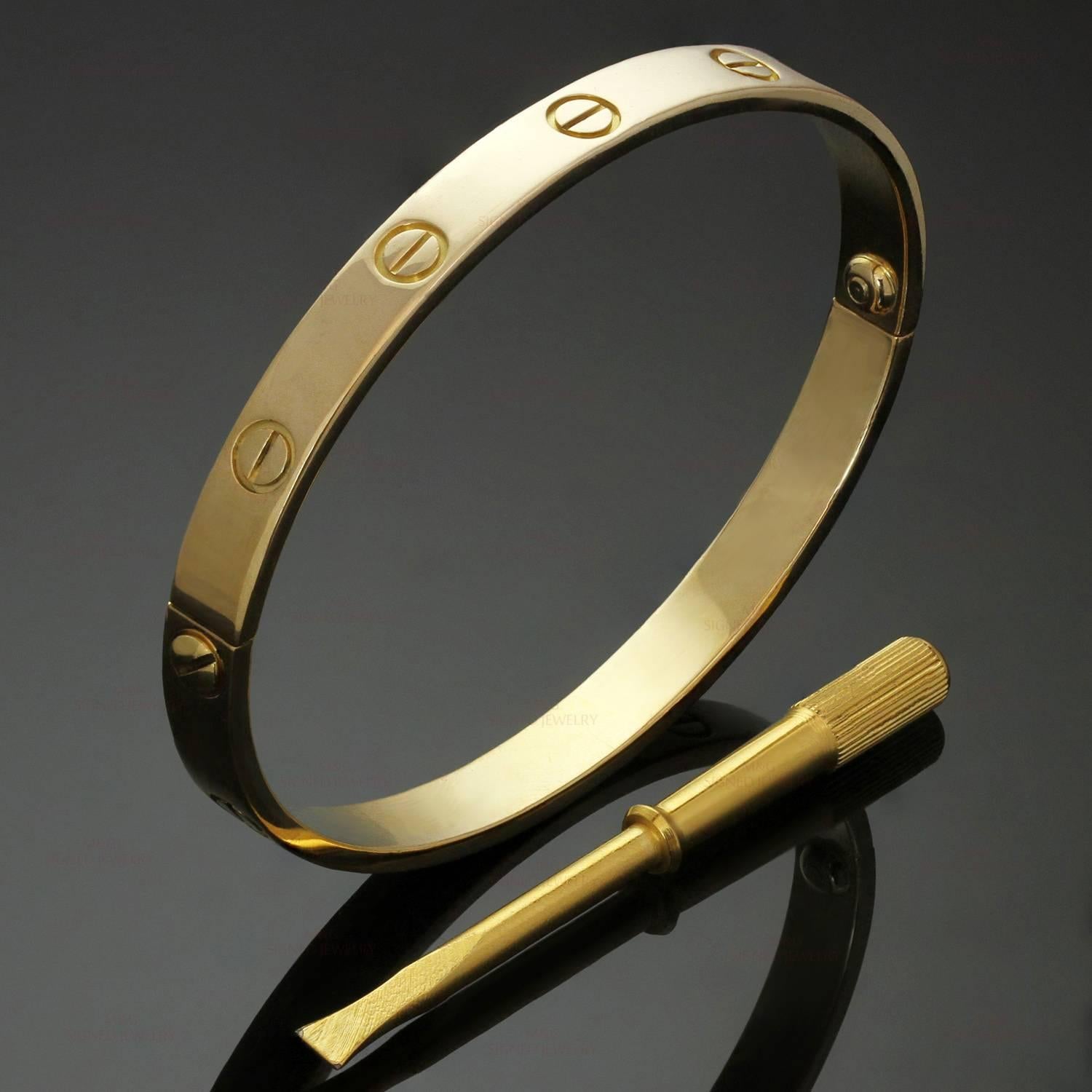 This iconic and timeless bracelet from Cartier's Love collection is finely crafted in 18k yellow gold and completed with the original Cartier screwdriver. This bangle is a size 18. Made in France circa 2000s. Comes with Cartier pouch and Carrier