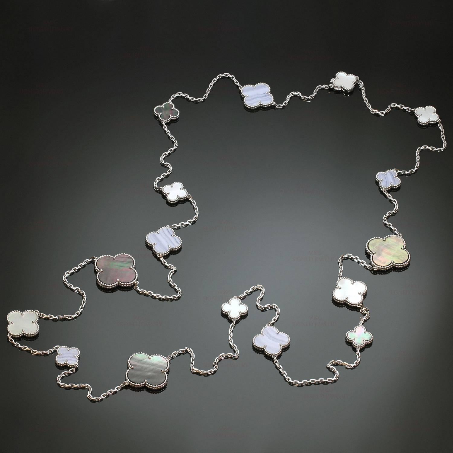 This stunning long necklace from the  Magic Alhambra collection by Van Cleef & Arpels is crafted in 18k white gold and features 16 lucky clover motifs with round bead settings beautifully inlaid with white and grey mother-of-pearl and