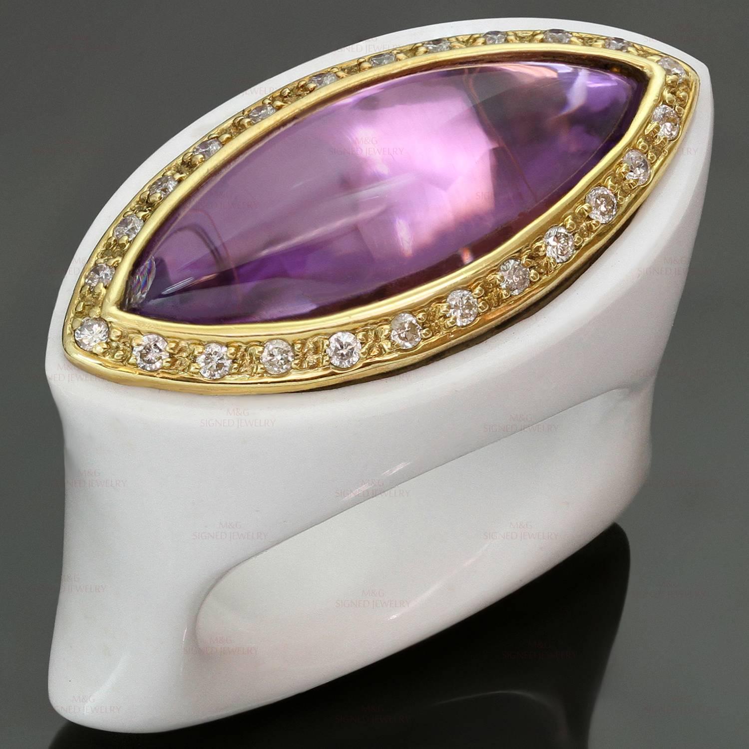 This fabulous cocktail ring features a chic design beautifully crafted in white agate  and set with a marquise-cut cabochon amethyst surrounded with brilliant-cut round diamonds set in 18k yellow gold. Made in Italy circa 2010s. Measurements: