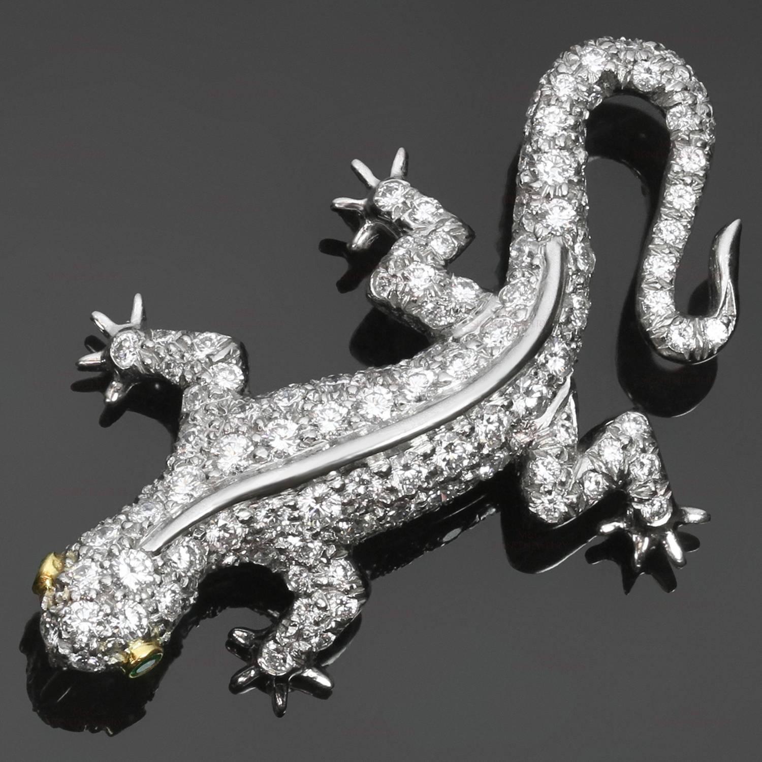 This rare and stunning Tiffany brooch is crafted in platinum in the shape of a salamander and pave-set with sparkling brilliant-cut round diamonds of an estimated 1.30 carats and completed with faceted emerald eyes of an estimated 0.05 carats