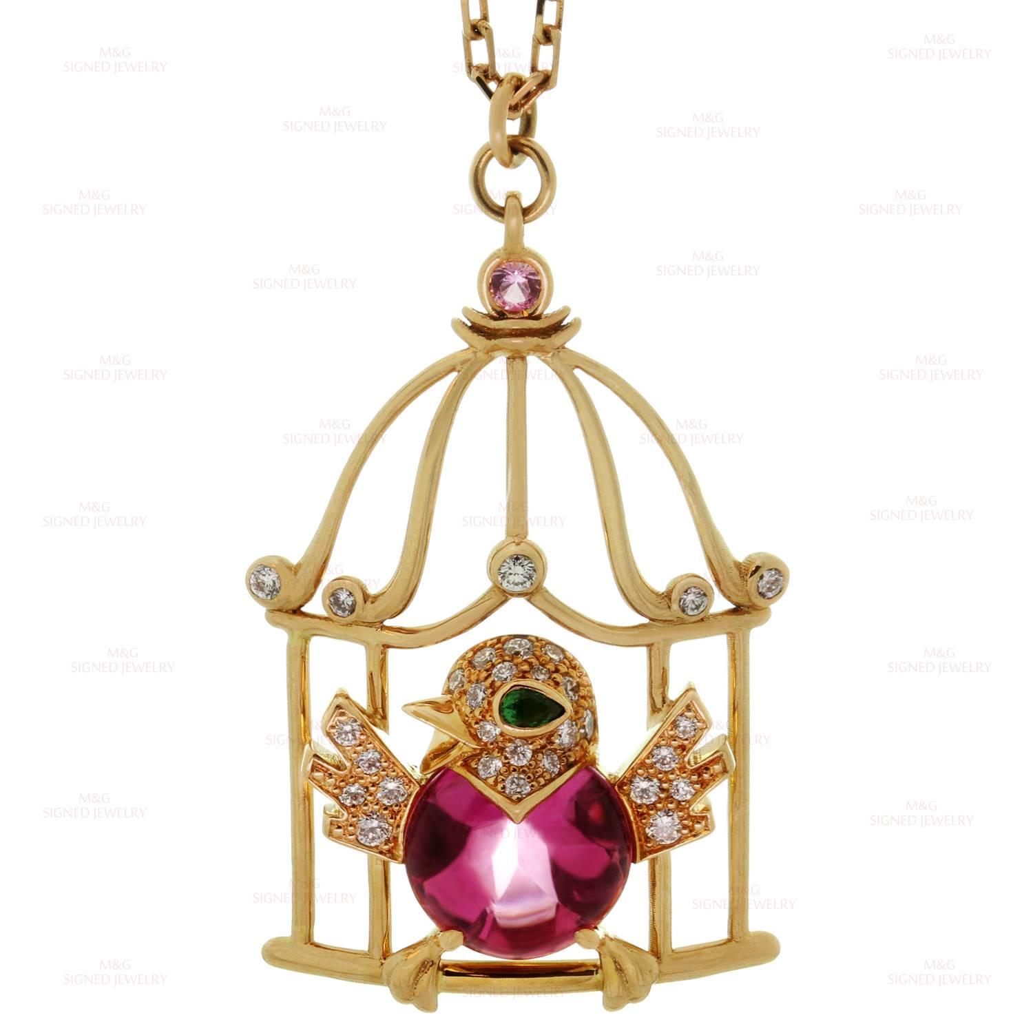 This gorgeous Cartier necklace features a bird outside of a cage crafted in 18k rose gold and set with an intense pink cabochon rubellite, a pink sapphire, a faceted peridot eye, and brilliant-cut round diamonds. During the German occupation of the