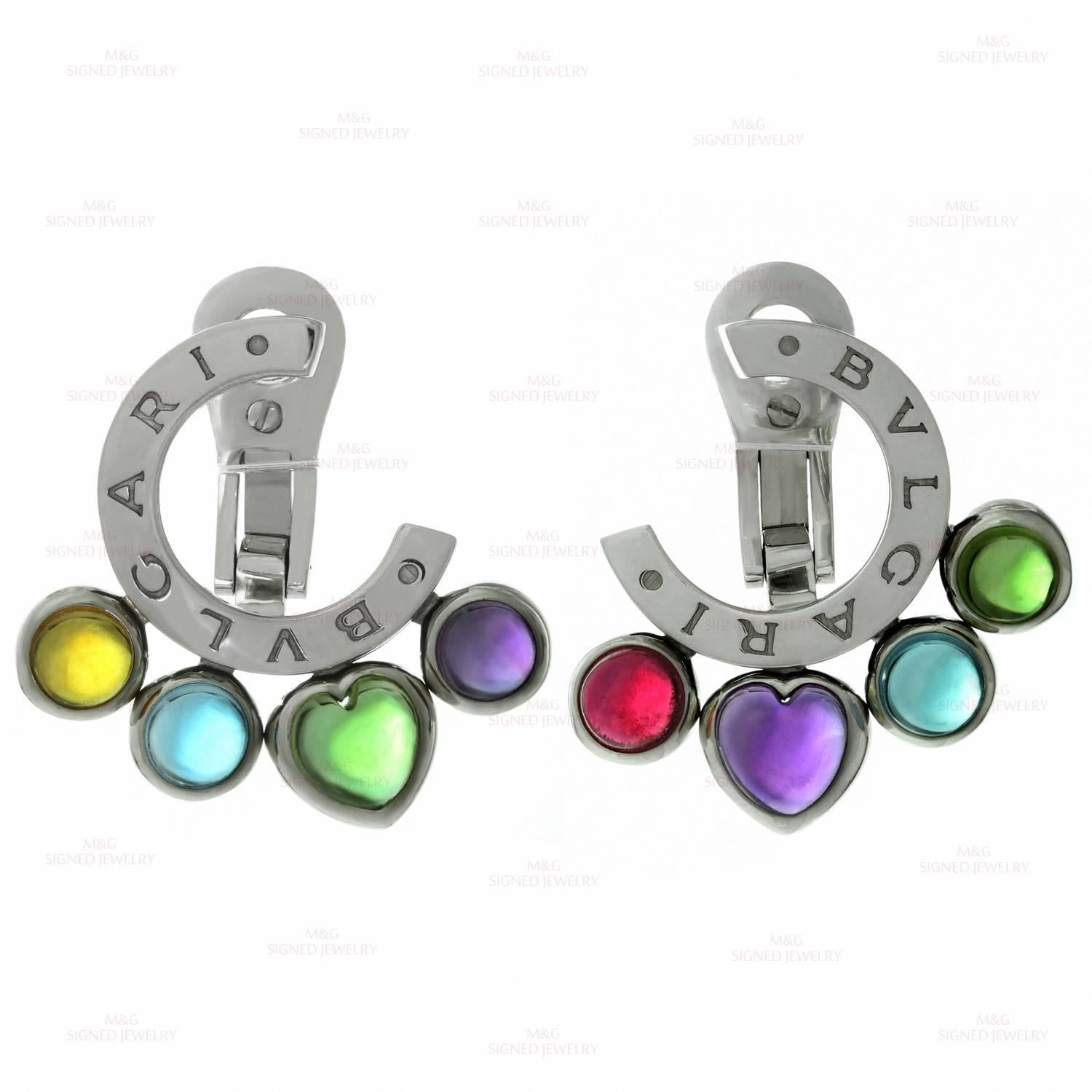 These stunning earrings from Bulgari's Allegra collection are crafted in 18k white gold and set with a vibrant array of cabochon gemstones - green peridot, pink tourmaline, amethyst, citrine  & blue topaz. Made in France circa 2010s.