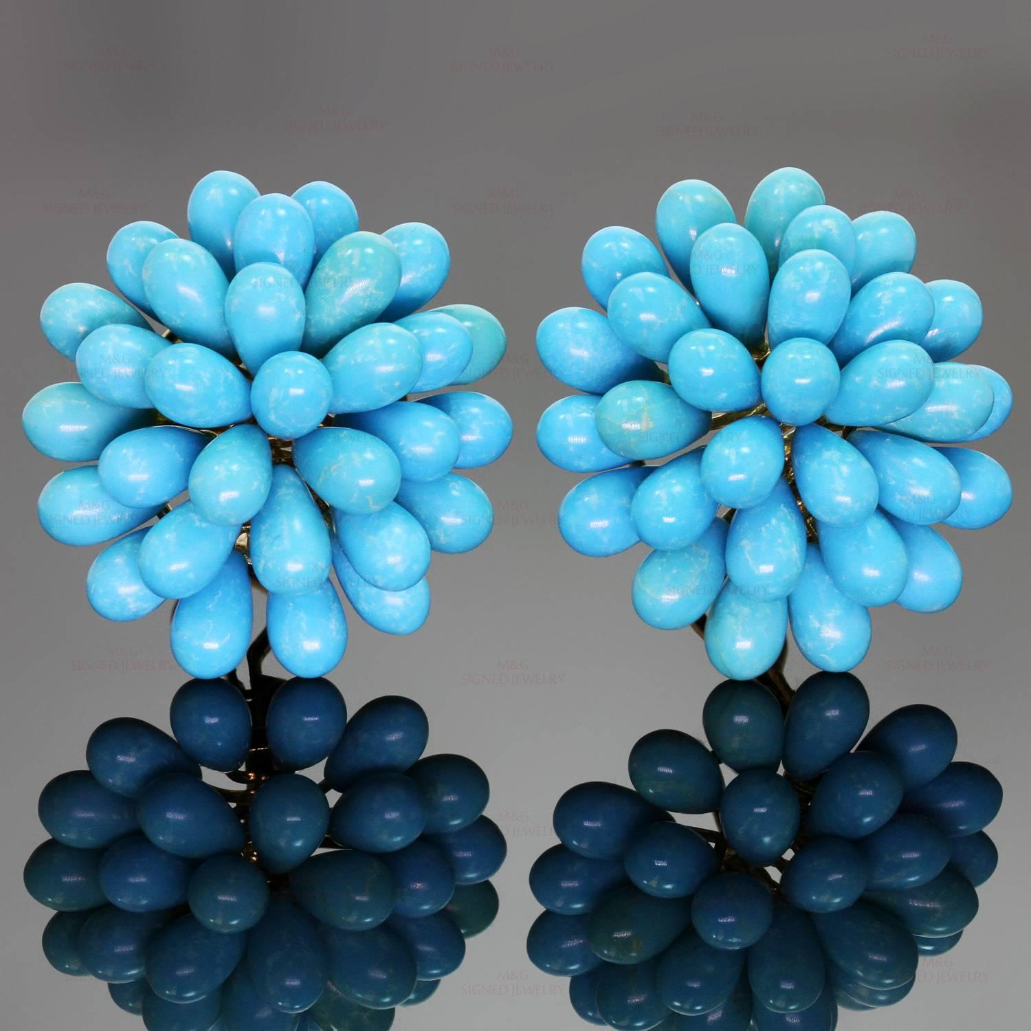 These vibrant lever-back earrings are crafted in 18k yellow gold and feature a cluster of natural turquoise stones with medium to medium deep blue color and good luster. Several stones are slightly faded greenish-blue, and one stone has a