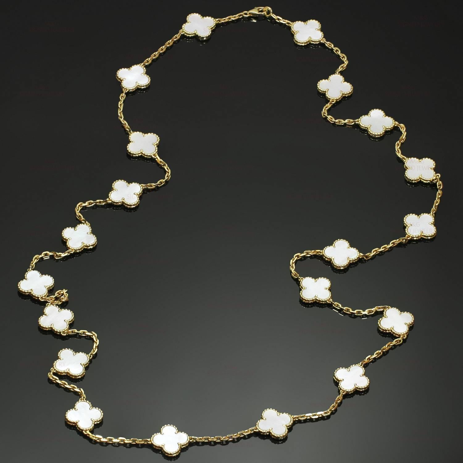 This classic Van Cleef & Arpels necklace is crafted in 18k yellow gold and features 20 lucky clover motifs beautifully inlaid with mother-of-pearl in round bead settings. Made in France circa 2000s. Measurements: 0.59" (15mm) width,