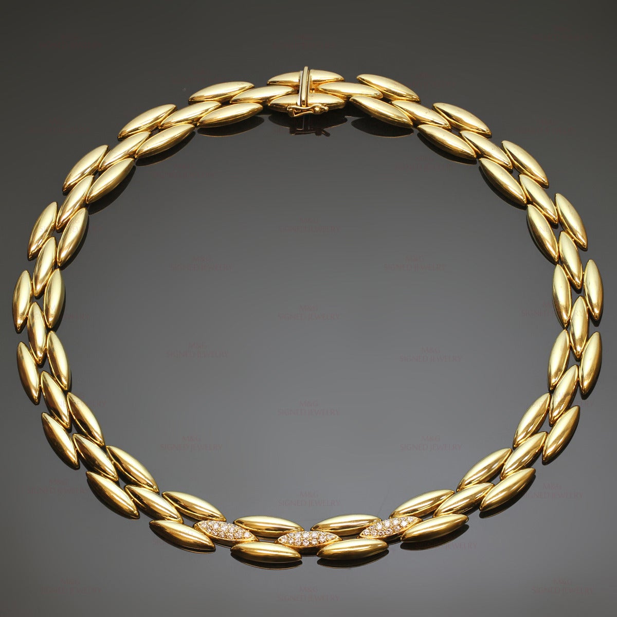 This chic necklace from the iconic Gentiane collection features a fluid almond shape link design made in 18k yellow gold and set with 45 brilliant-cut round E-F VVS1-VVS2 diamonds of an estimated 1.30 carats. Made in France circa 1980s.