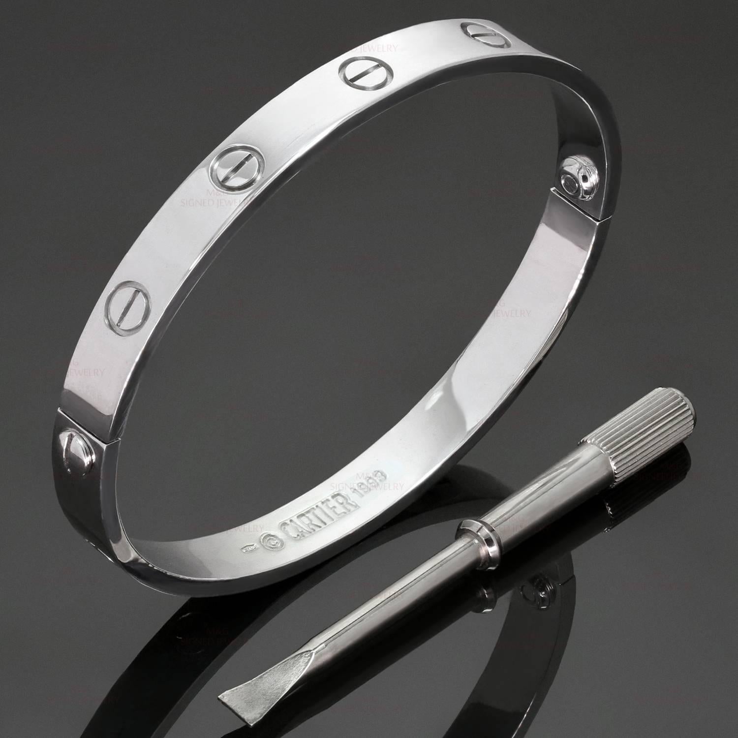 This iconic and timeless bracelet from Cartier's Love collection is crafted in 18k white gold and completed with the original Cartier screwdriver. This bangle is a size 17. Made in France circa 1993. Excellent condition. Comes in Cartier pouch.