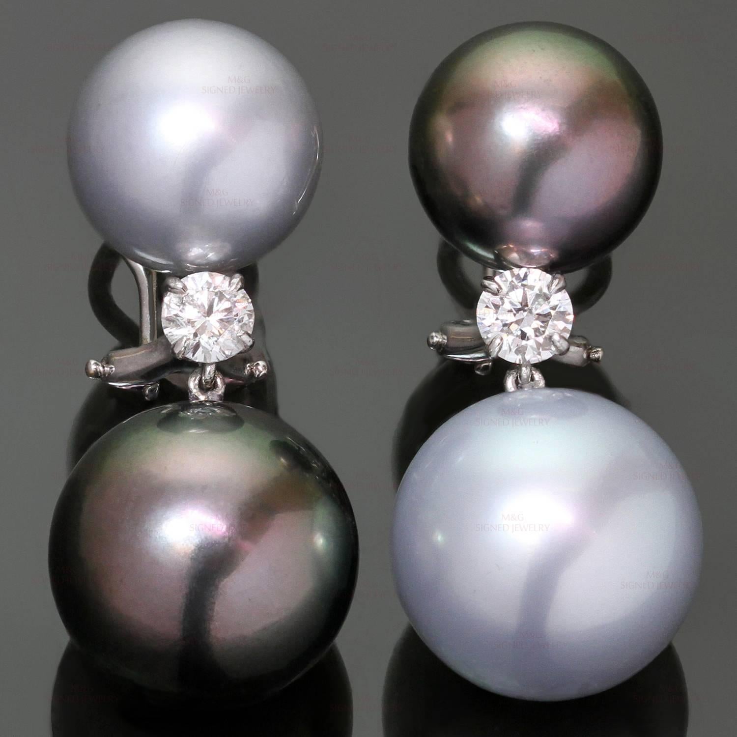 These gorgeous earrings are crafted in 18k white gold and feature a pair of Tahitian brownish-gray pearls and a pair of Tahitian light grey pearls,, measuring 12.0mm and 14.00mm, and accented with 2 round modern-cut diamonds of an estimated 0.60