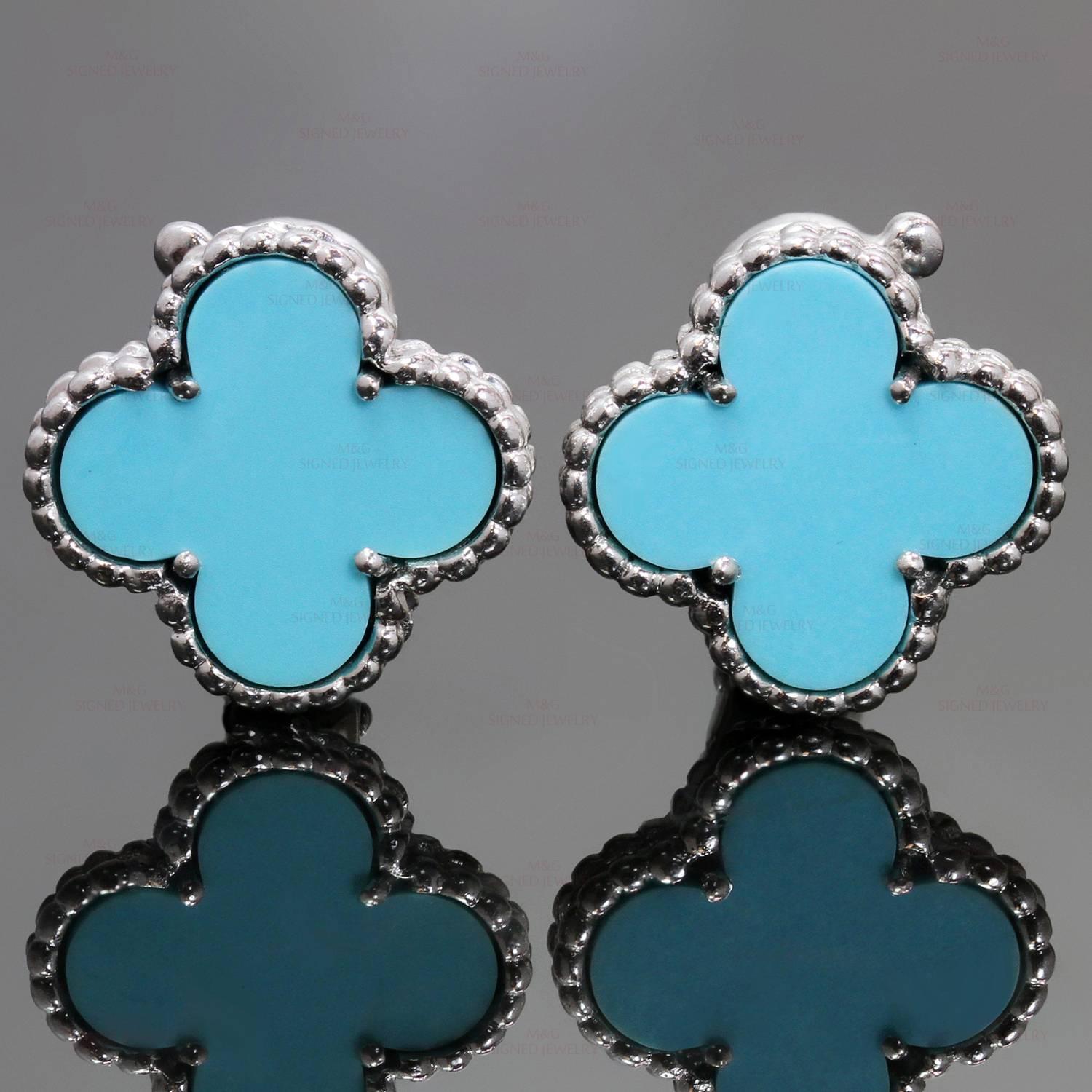 These stunning Van Cleef & Arpels lever-back earrings from the vintage Alhambra collection feature the lucky clover design crafted in 18k white gold and set with blue turquoise. Made in France circa 2000s. Measurements: 0.59