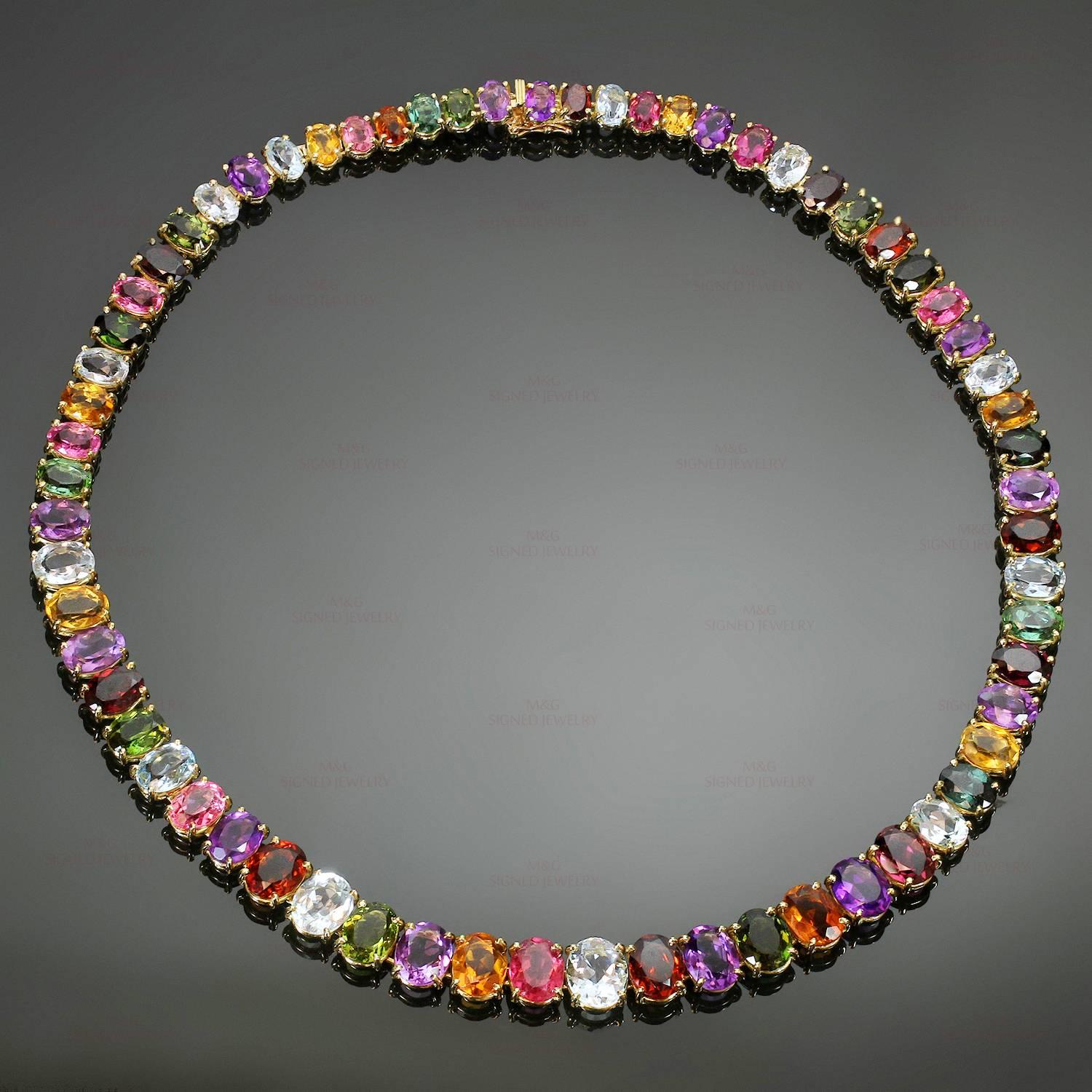 This stunning H. Stern necklace is crafted in 18k yellow gold and features a lively and sparkling array of colorful prong-set oval stones: medium purple amethyst with lavender hues, light blue medium to medium deep aquamarine, brownish and
