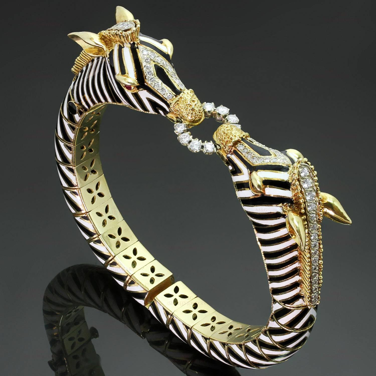This gorgeous Pierino Frascarolo bangle bracelet features a double zebra head design crafted in 18 yellow gold with black and white enamel stripes, 70 brilliant-cut round diamonds of an estimated 1.35 carats, and ruby eyes. With a 7.0-7.5 inch
