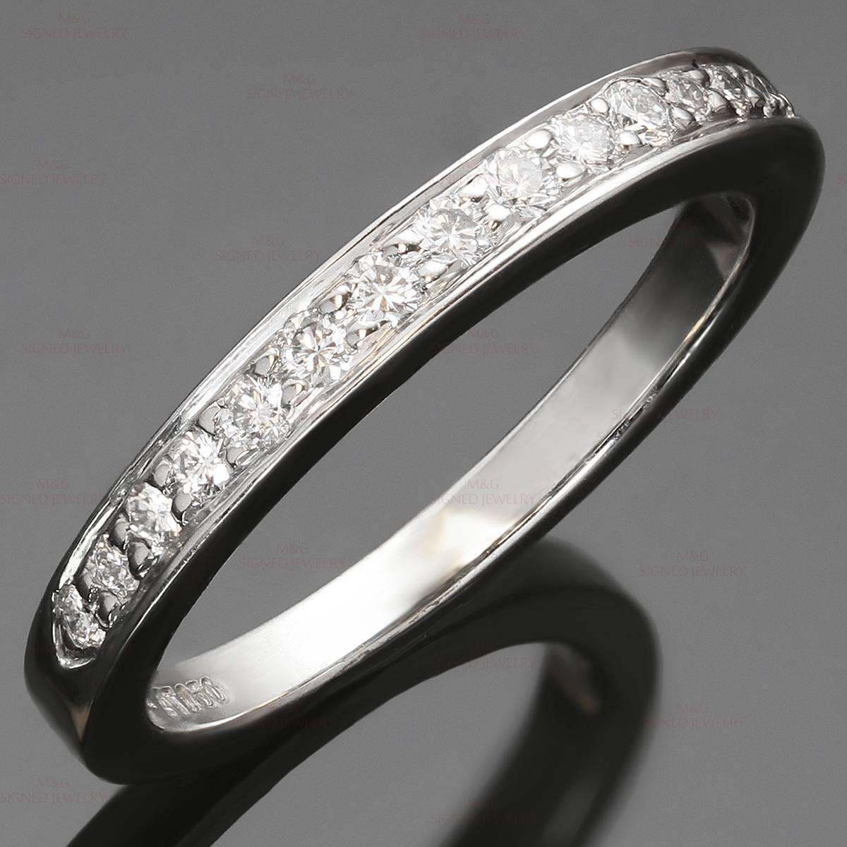 This classic Tiffany & Co. wedding band is crafted in fine platinum and set with a half-circle of brilliant-cut round diamonds of an estimated 0.22 carats. Made in United States circa 2010s. Measurements: 2.5mm width. The ring size is 6 - EU 52.
