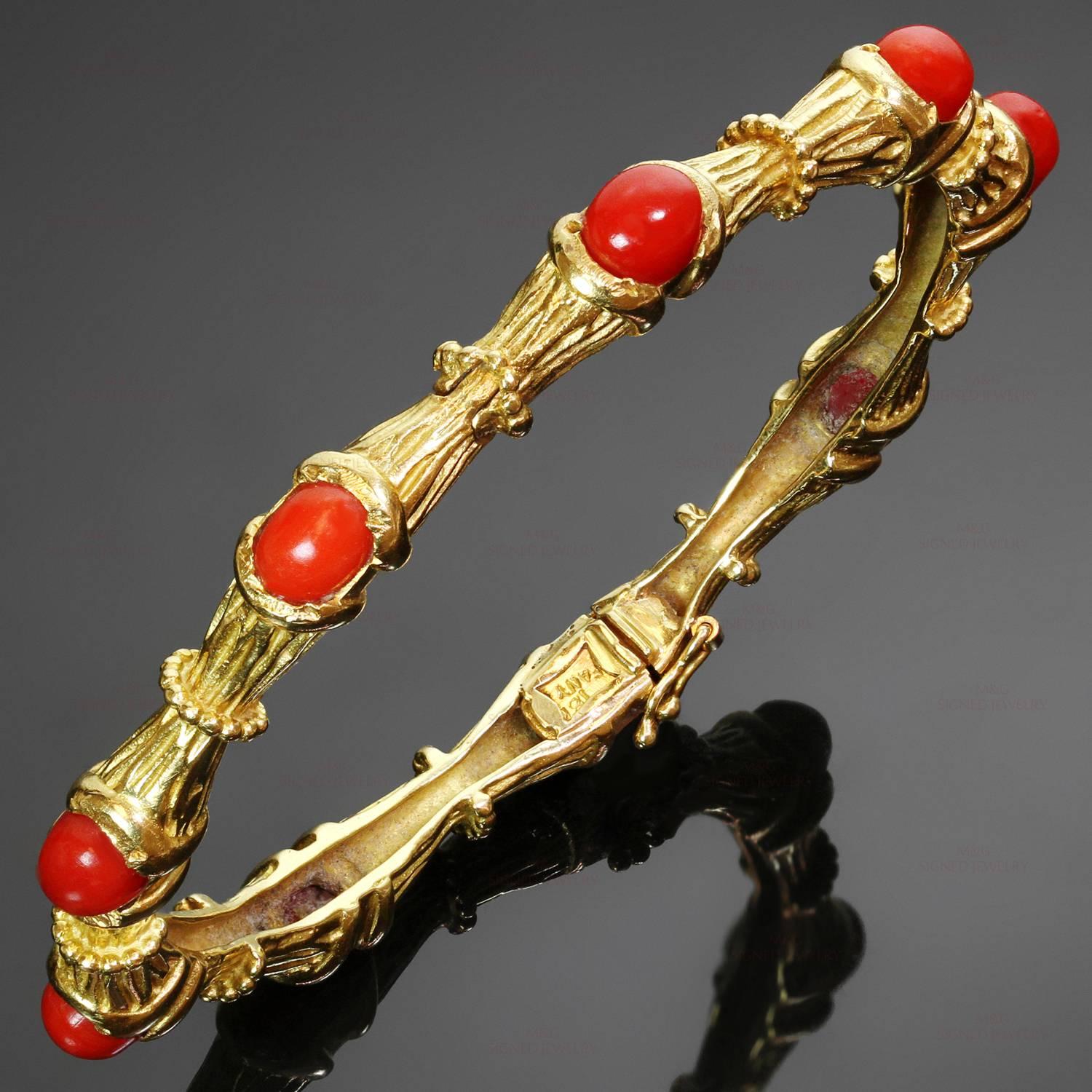 This fabulous Tiffany bangle bracelet features a bamboo design crafted in 18k yellow gold and set with oval oxblood corals. Made in United States circa 1970s. Measurements: 0.27