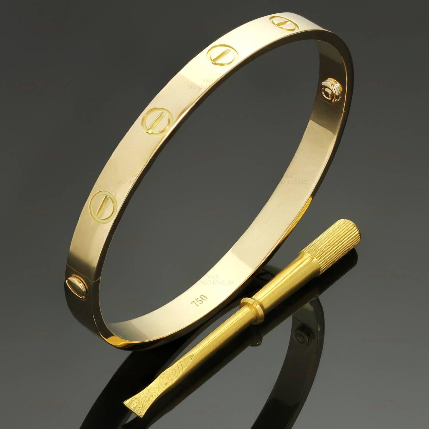 This iconic and timeless bracelet from Cartier's Love collection is finely crafted in 18k yellow gold and completed with the original Cartier screwdriver and pouch. This bangle is a size 18. Made in United France circa 2000s. Excellent condition.