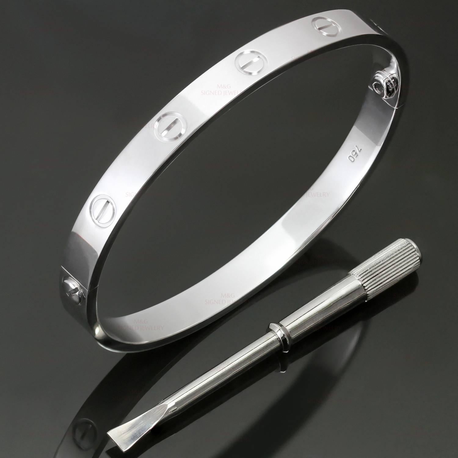 This classic Cartier bangle from the iconic Love collection is made in 18k white gold and comes with the original screwdriver. This bracelet is a size 17. . 