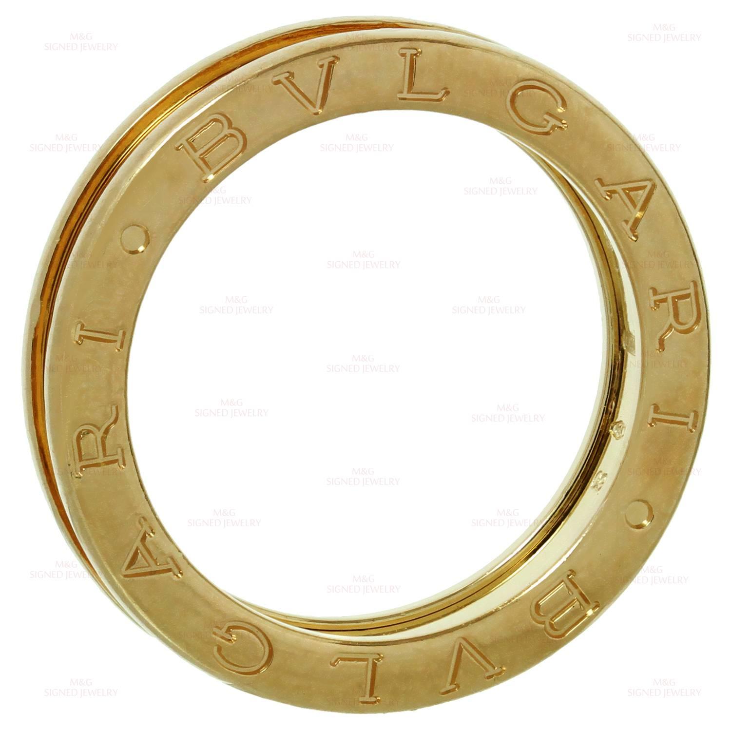 This unisex ring from Bulgari's iconic B.zero1 collection is crafted in 18k rose gold and features the single band design engraved with the Bvlgari logo on both sides. Made in Italy circa 2010s. Measurements: 0.19" (5mm) width. The ring size is