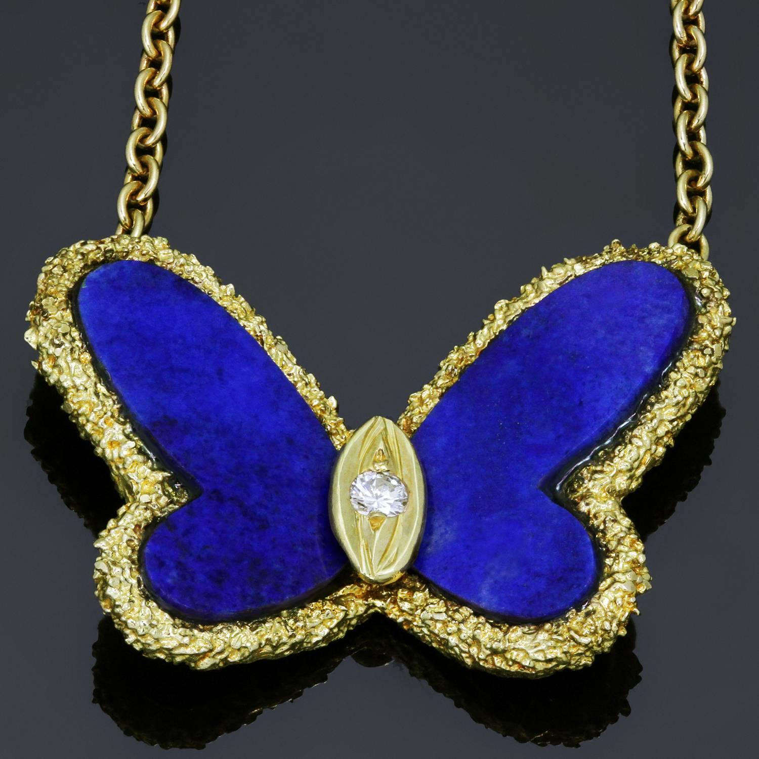 This stunning vintage Van Cleef & Arpels butterfly necklace from the timeless Flying Beauties collection is crafted in finely textured 18k yellow gold and featuring Lapis Lazuli wings and a sparkling solitaire brilliant-cut diamond of an estimated