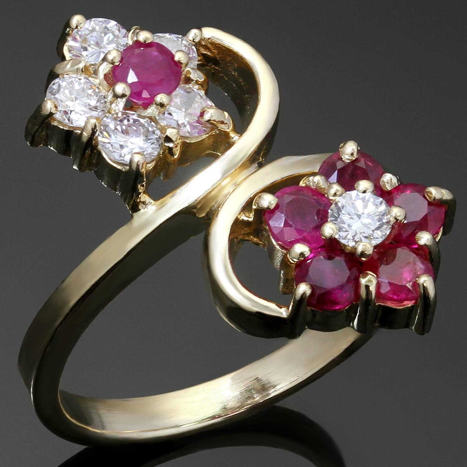 This gorgeous vintage ring features a whimsical two flower design crafted in 14k yellow gold and set with brilliant-cut round diamonds of an estimated 0.40 carats and red rubies of an estimated 0.50 carats. Made in United States circa 1980s. 