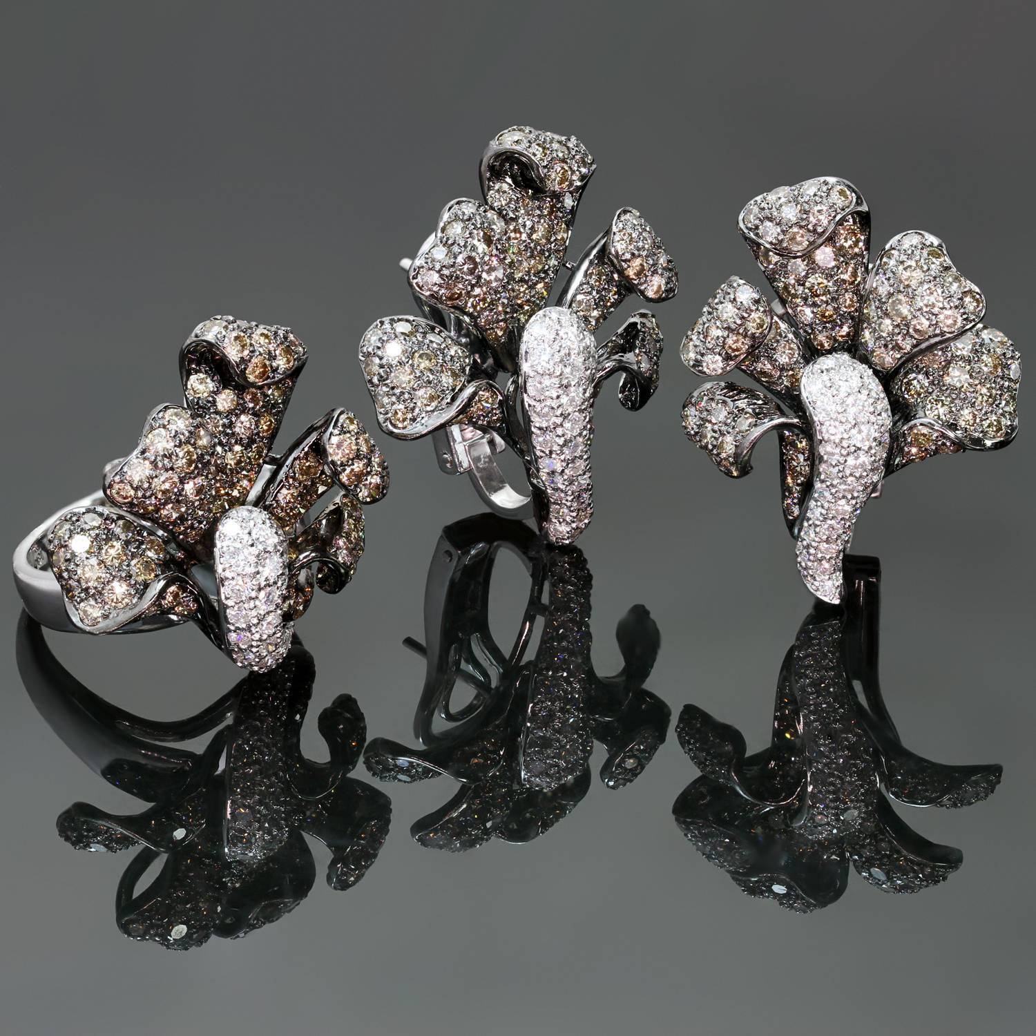 This absolutely stunning earrings & ring set features a sparkling flower-shaped design crafted in 18k white gold. The earrings have about 64 white diamonds of an estimated 1.60 carats and about 160 champagne diamonds of an estimated 6.40 carats.
