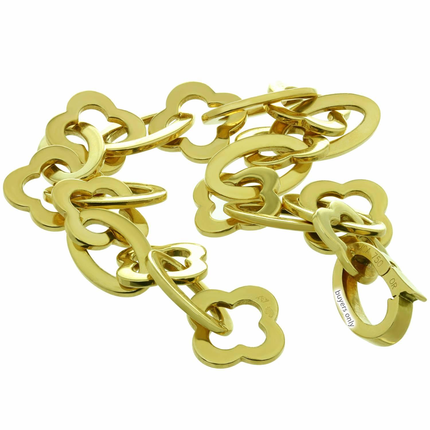 This stunning Van Cleef & Arpels bracelet from the classic Byzantine Alhambra collection features oval and clover links crafted in 18k yellow gold and completed with a foldover clasp. Made in France circa 2000s. Measurements: 0.47