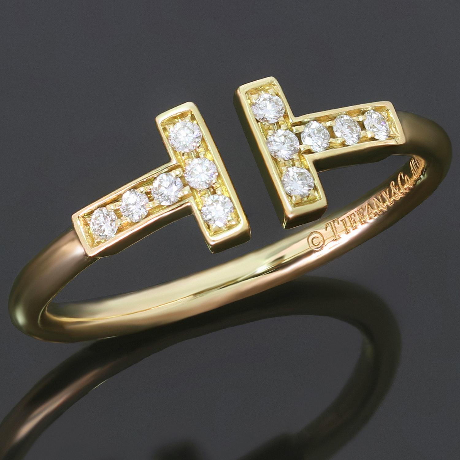 This gorgeous modern Tiffany ring is crafted in 18k yellow gold and set with brilliant-cut round diamonds. The Tiffany T Wire collection features graphic angles, clean lines, and dazzling diamonds accentuating the ring's bold and timeless form. Made