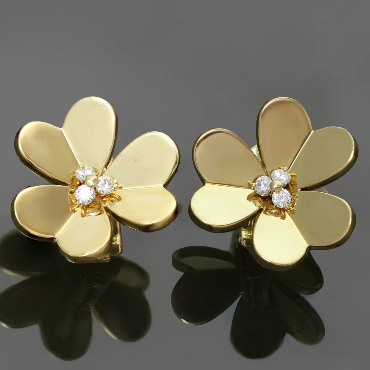 These fabulous Van Cleef & Arpels earrings from the iconic Frivole collection are made in 18k yellow gold and feature a flower design set with 6 brilliant-cut round E-F VVS1-VVS2 diamonds of an estimated 0.35 carats. Made in France circa 1990s.