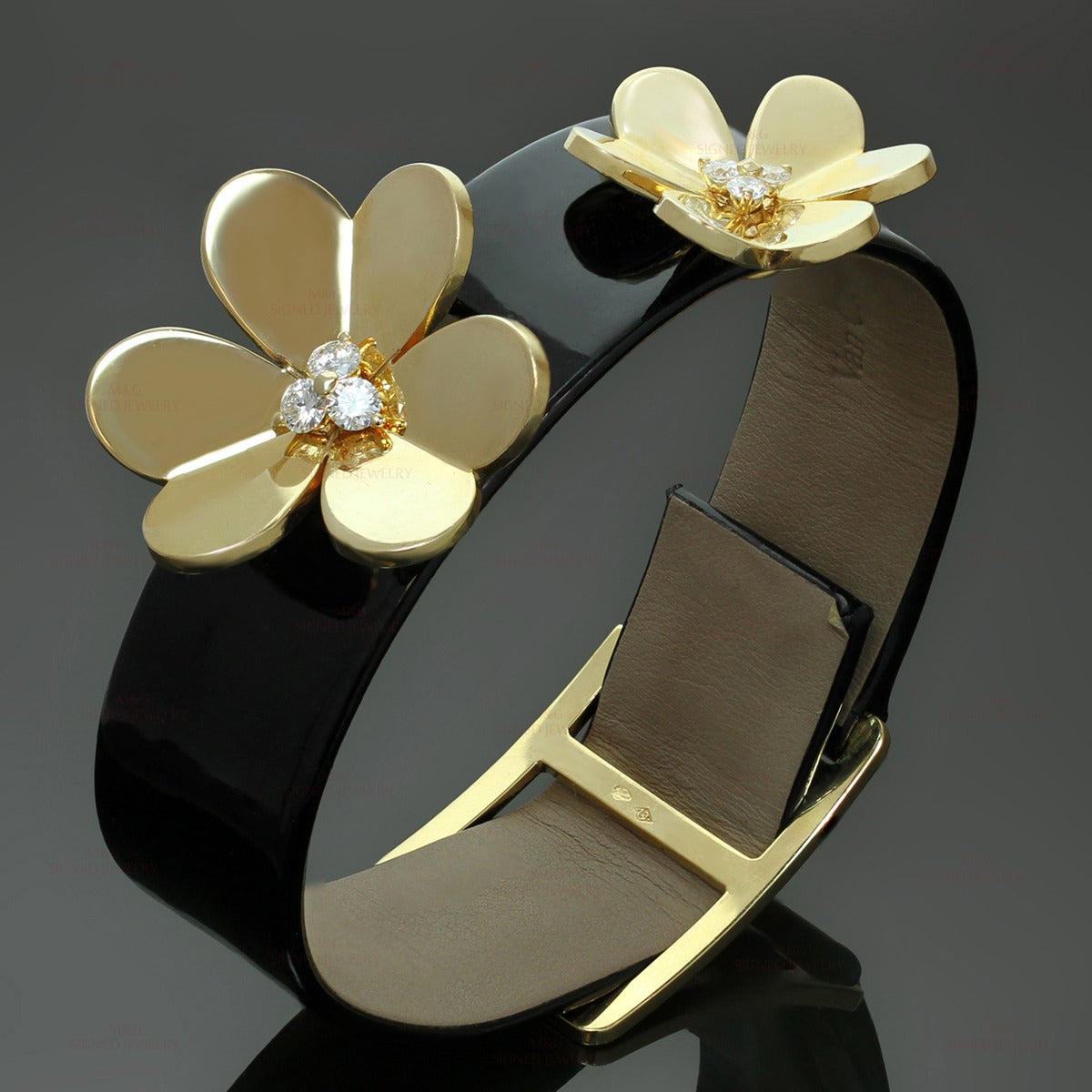 This fabulous Van Cleef & Arpels bracelet from the iconic Frivole collection is made in black patent leather and beautifully mounted with graduated 18k yellow gold flowers prong-set with X brilliant-cut round E-F VVS1-VVS2 diamonds of an estimated