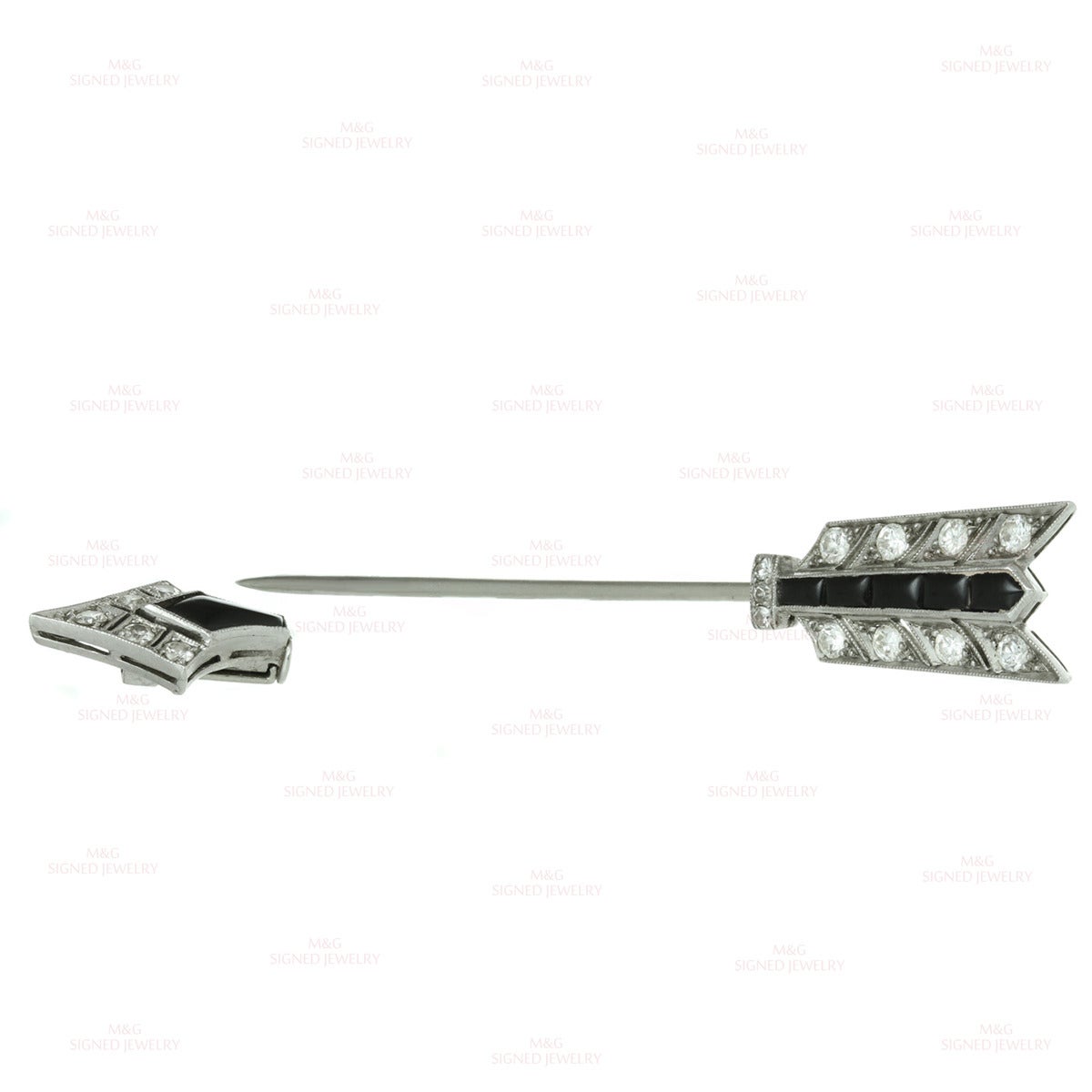 This timeless Cartier jabot arrow pin from the elegant Belle Epoque period is made in fine platinum and set with cabochon black onyx stones and old-mine-cut H-I VVS2-VS1 diamonds of an estimated 0.60 carats. Made in France circa 1920s. Measurements: