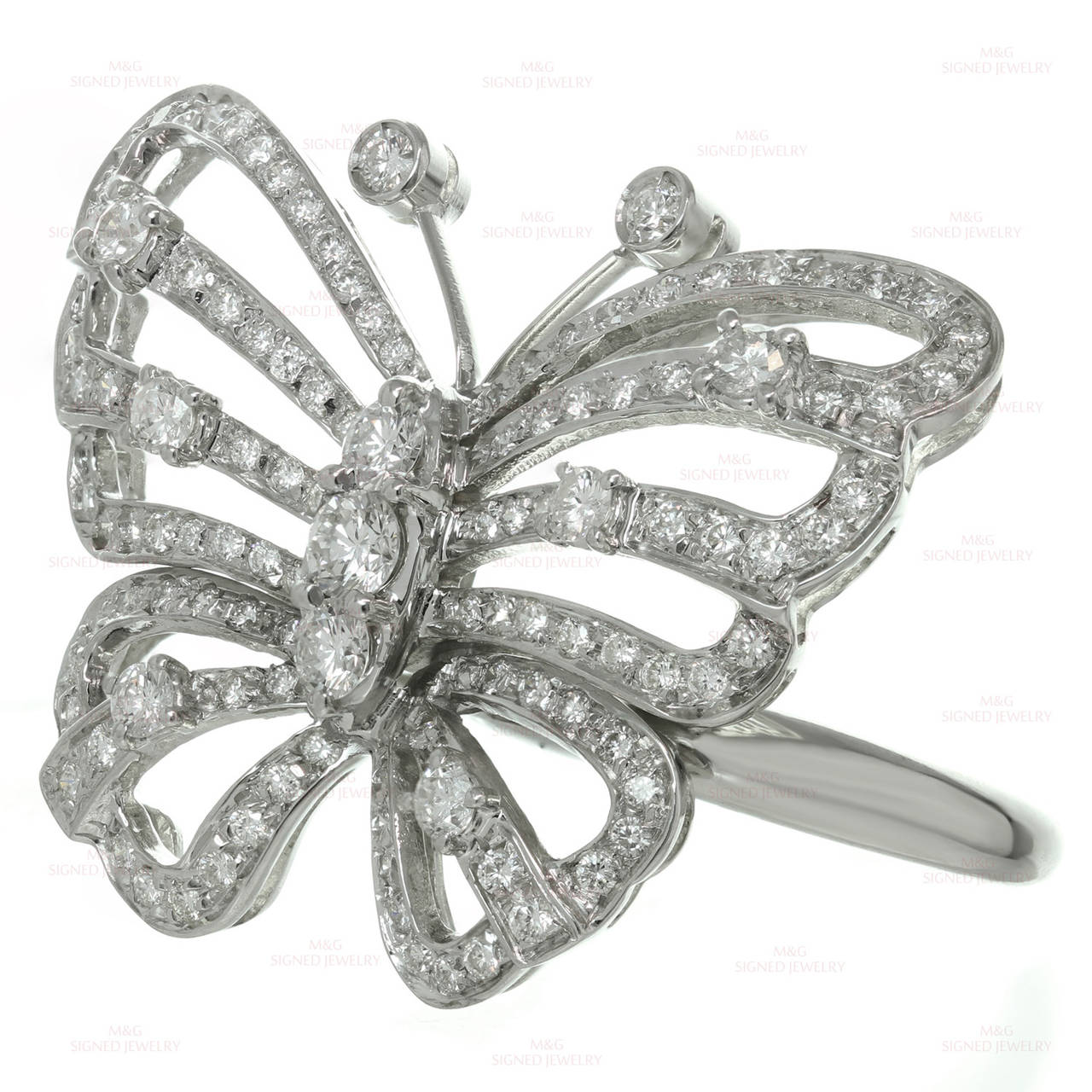 This gorgeous modern ring features an elegant butterfly design crafted in 18k white gold and set with sparkling brilliant-cut round G-H VS1-VS2 diamonds of an estimated 2.30 carats. Measurements: 1.22