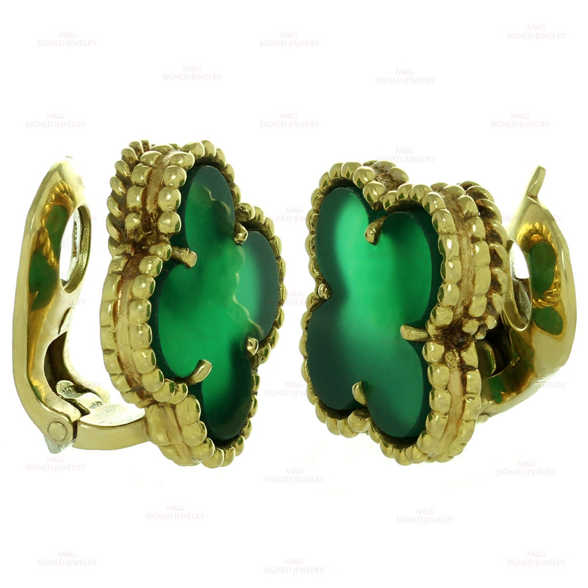 These stunning Van Cleef & Arpels clip-on earrings from the vintage Alhambra collection feature the lucky clover design crafted in 18k yellow gold and set with green chalcedony stones. Made in France circa 1970s. Measurements: 0.59" (15mm)