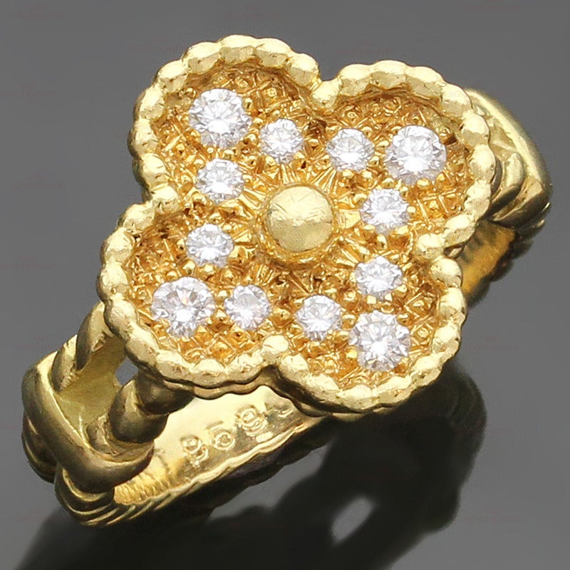 This stunning Van Cleef & Arpels ring from the Vintage Alhambra collection is crafted in 18k yellow gold and features the luckly clover design set with brilliant-cut round D-F VVS1-VVS2 diamonds of an estimated 0.32 carats. Made in France circa