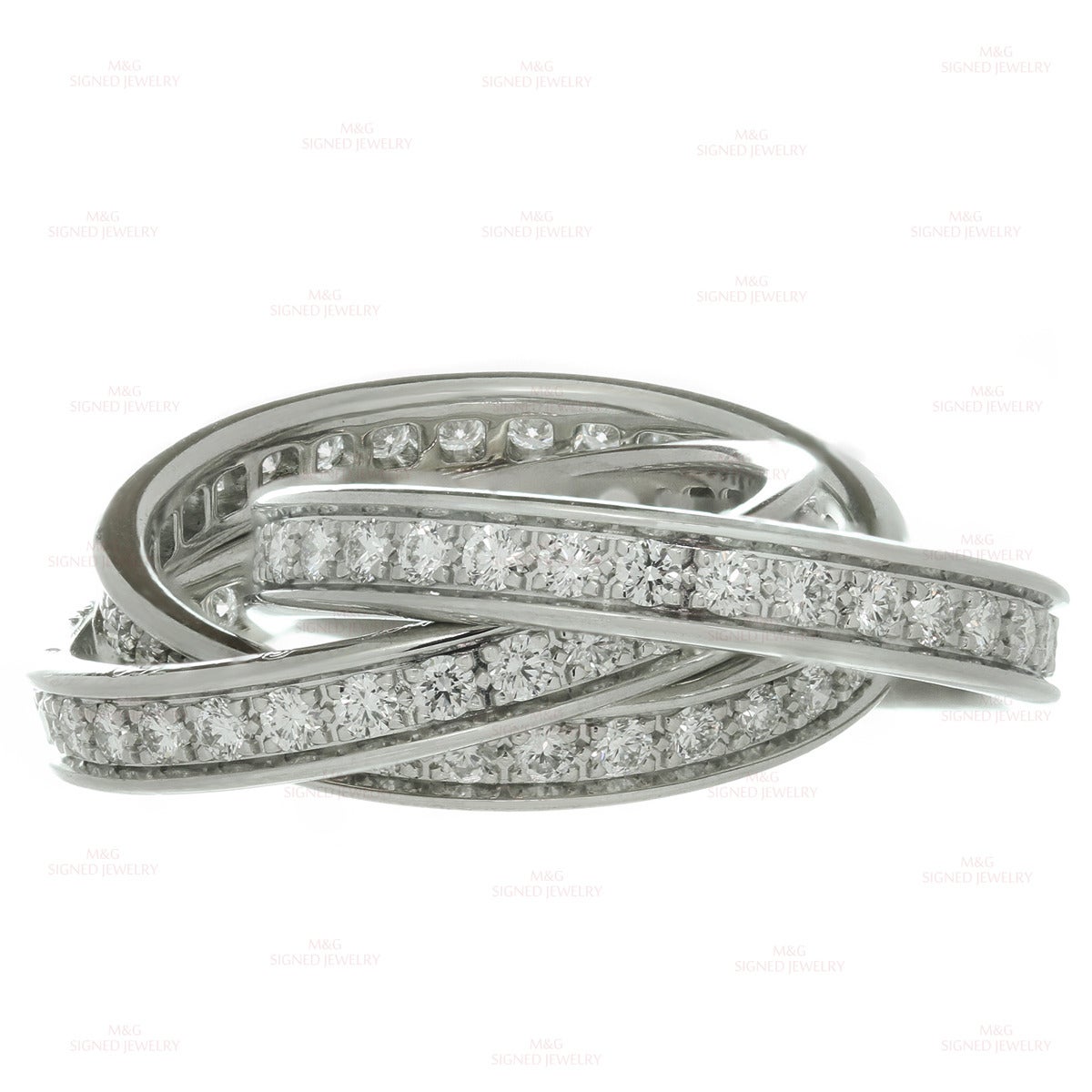 This modern Cartier ring from the iconic Trinity collection features 3 interconnected bands crafted in 18k white gold and stunningly set with brilliant-cut round E-F VVS1-VVS2 diamonds of an estimated 2.0 carats. 

Measurements: 0.27