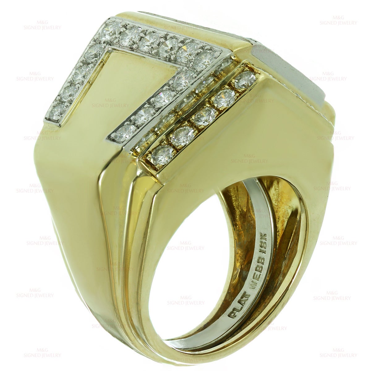 This chic geometric ring by David Webb is crafted in 18k yellow gold and set in fine platinum with round brilliant-cut E-F VVS2-VS1 diamonds of an estimated 2.0 carats. Made in United States circa 1990s. Measurements: 0.98