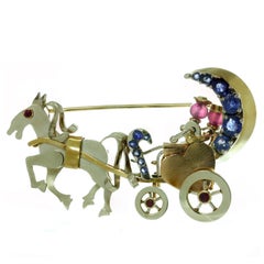 1940s Ruby Sapphire Tri-Color Gold Couple in Movable Horse Carriage Brooch