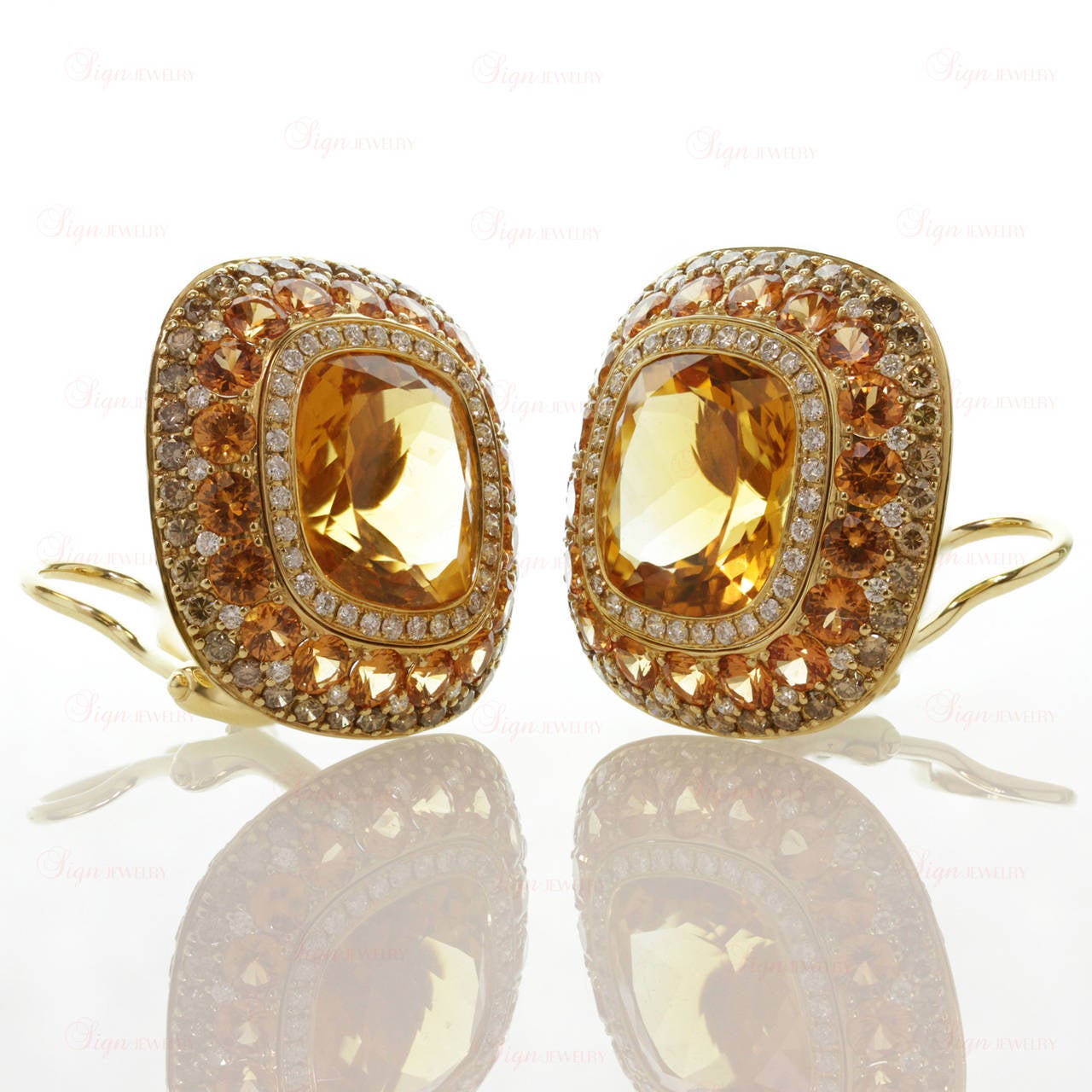 orange sapphire earrings yellow gold