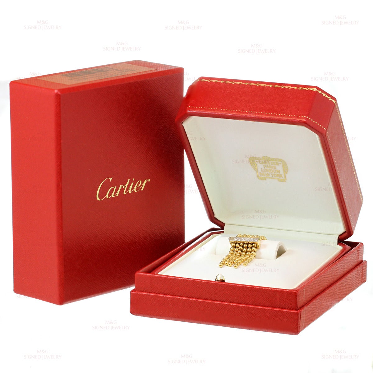 This stunning Cartier ring from the Paris Nouvelle Vague features an elegant beaded chain design crafted in 18k yellow gold and accented with round brilliant-cut diamonds of an estimated 0.30 carats. Size is adjustable. Made in France circa 2000s.