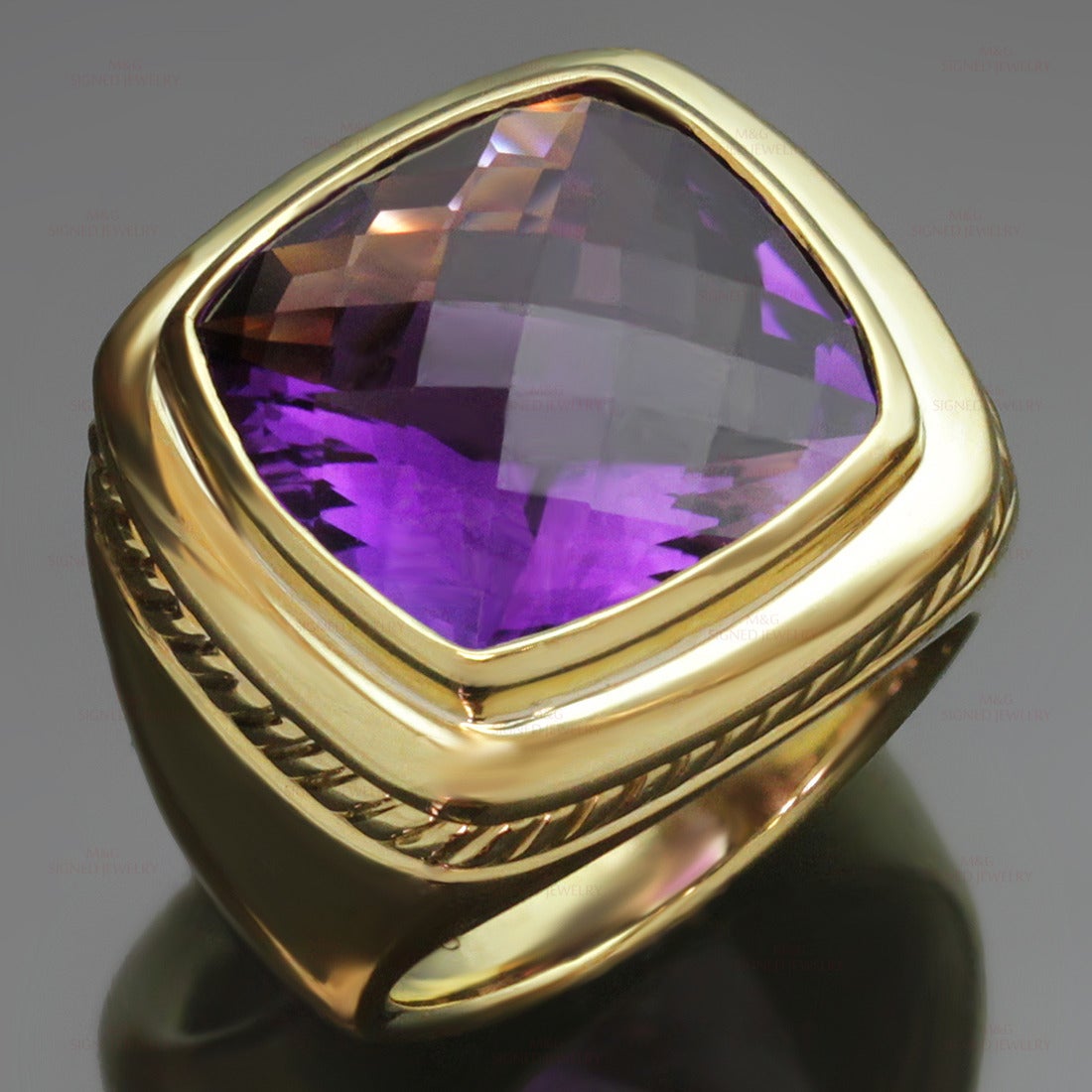This modern cocktail ring from David Yurman's Albion collection is made in 18k yellow gold and beautifully bezel-set with a faceted 15.0mm amethystone stone. Vibrant and stylish. Measurements: 0.78" (20mm) width. The ring size is 6 - EU 52.
