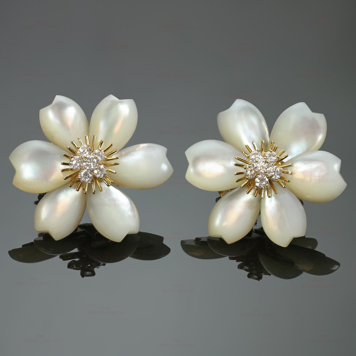 These sophisticated Christmas Rose clip-on earrings from Van Cleef & Arpels Rose De Noel collection are made in 18k yellow gold and feature delicate winter-blooming flower design composed of mother-of-pearl petals and sparkling  centers prong-set