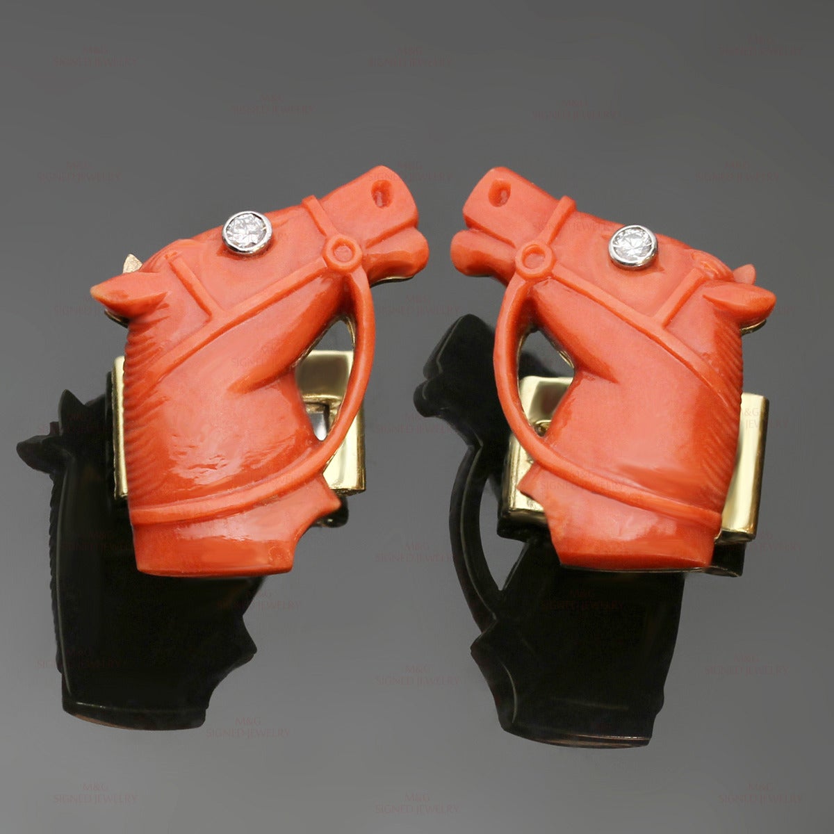 These unique cufflinks are made in 18k yellow gold and feature beautifully hand-carved red coral horse heads accented with diamond eyes bezel-set in white gold. United States circa 1960s. Measurements: 0.70