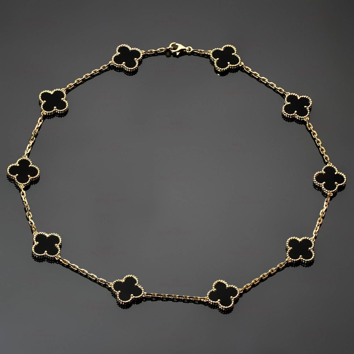 This classic Van Cleef & Arpels necklace is crafted in 18k yellow gold and features 10 lucky clover motifs beautifully inlaid with black onyx in round bead settings. Made in France circa 2000s. Measurements: 0.59