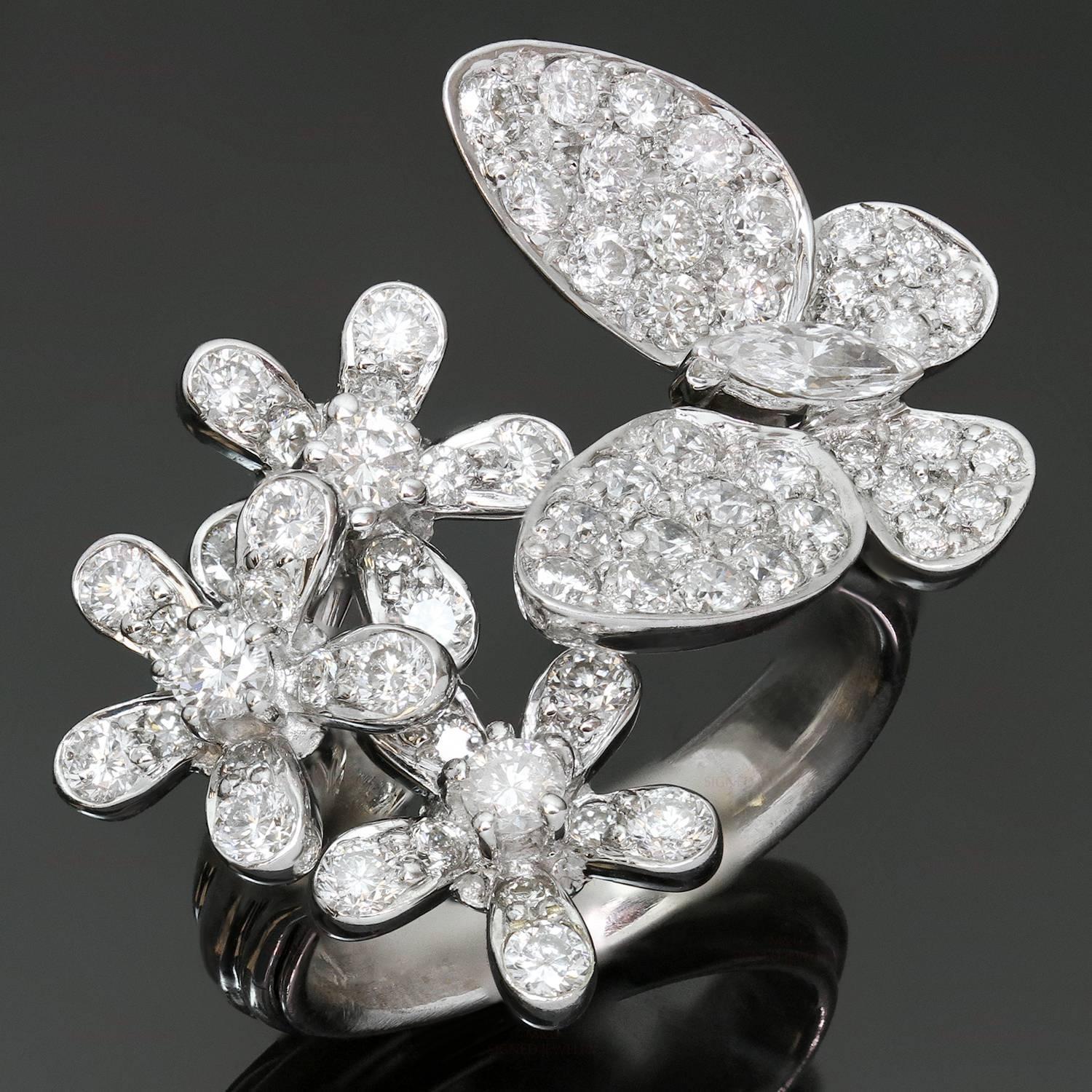 This exquisite ring features a flower and butterfly design crafted in 18k white gold and set with brilliant-cut round diamonds of an estimated 1.26 carats. Made in United States circa 2010s. Measurements: 0.78