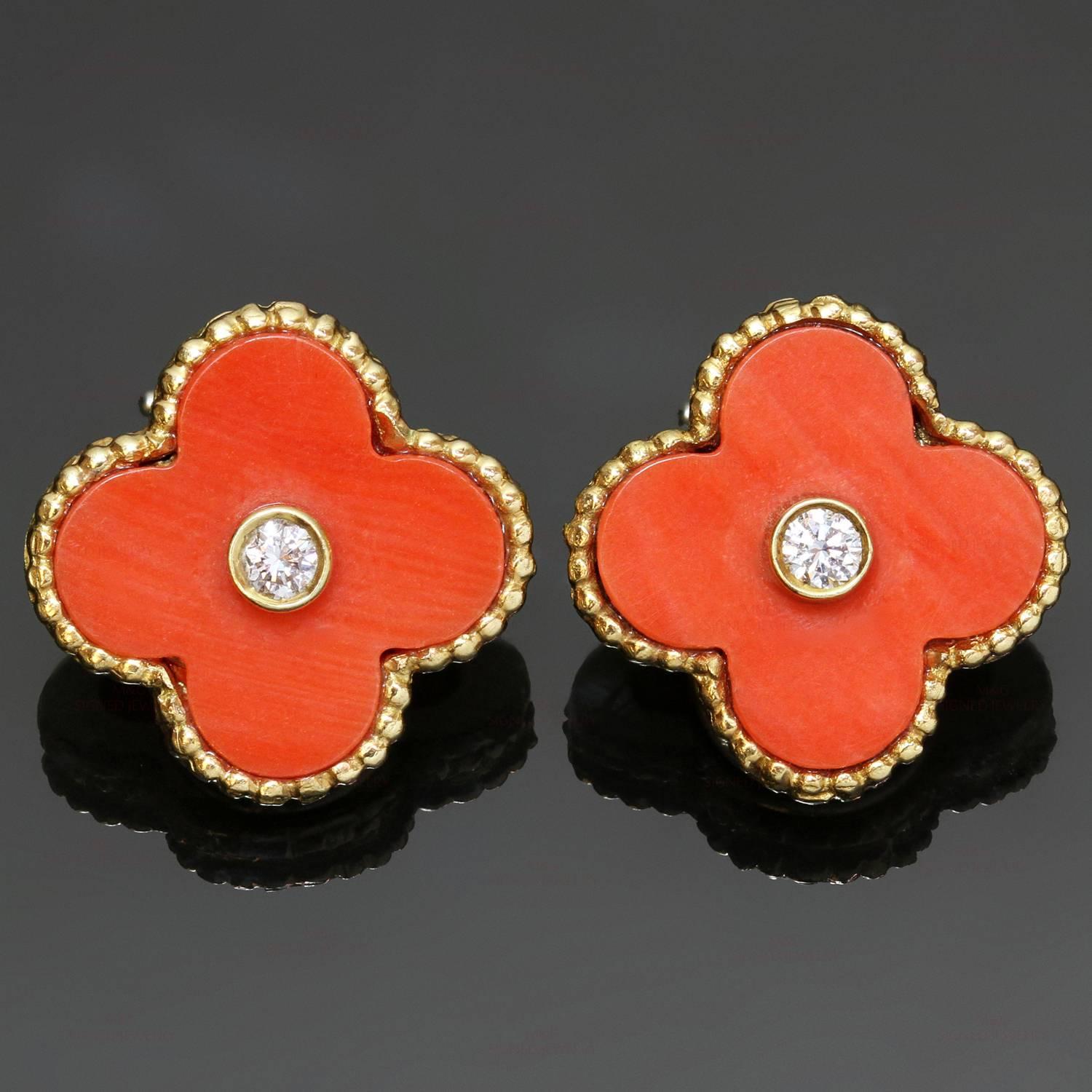 These extremely rare clip-on earrings from the Alhambra collection by Van Cleef & Arpels feature the iconic lucky clover motif crafted in 18k yellow gold and set with orange-red corals with strong saturation and medium tone and brilliant-cut round