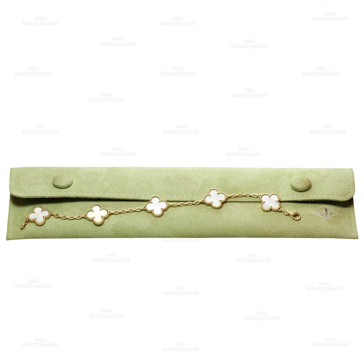 This classic bracelet from the iconic Alhambra collection by Van Cleef & Arpels is crafted in 18k yellow gold and features 5 lucky clover motifs set with mother-of-pearl. Made in France circa 2014. Measurements: 0.27