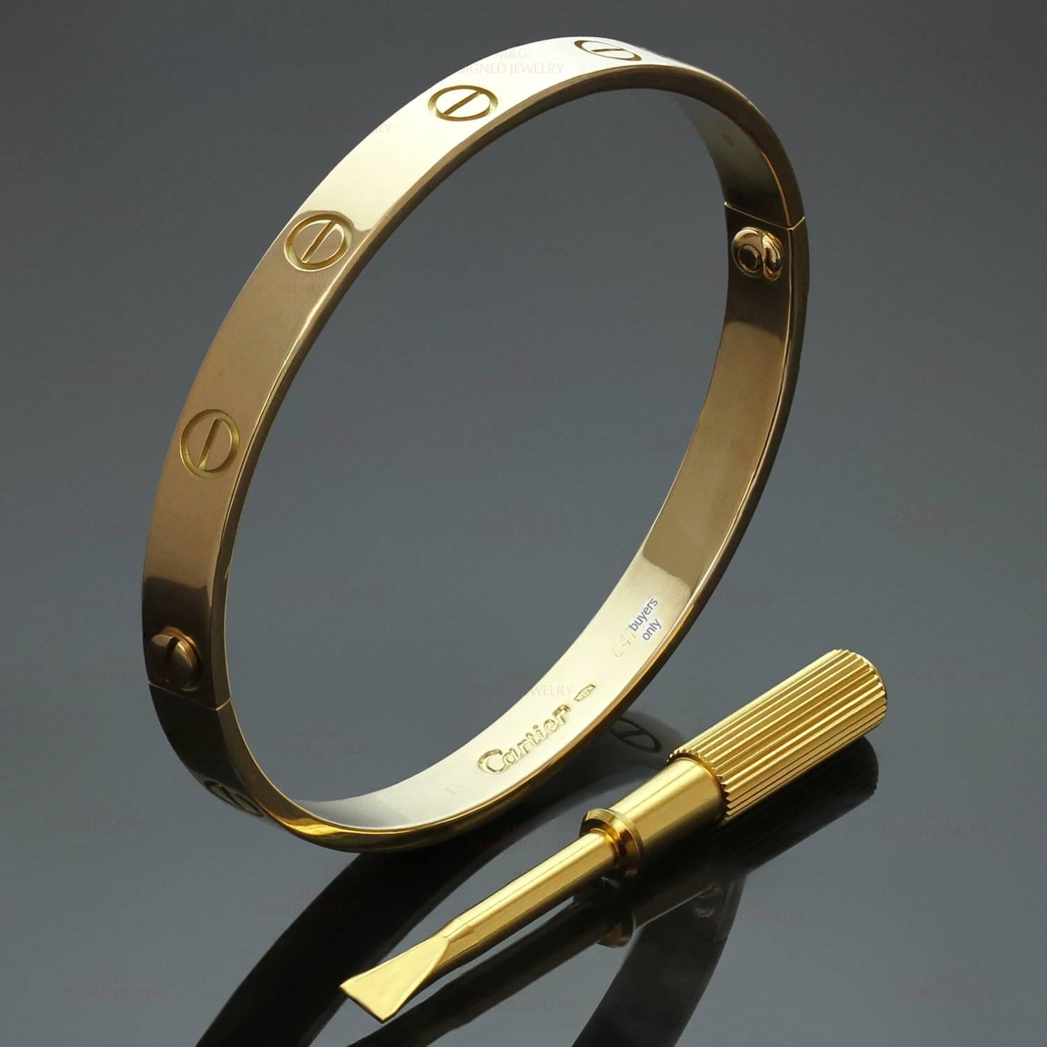 This iconic bracelet from Cartier's Love collection is finely crafted in 18k yellow gold and completed with the original Cartier screwdriver. This bangle is a size 18. Made in France circa 2000s. Measurements: 0.23" (6mm) width. 