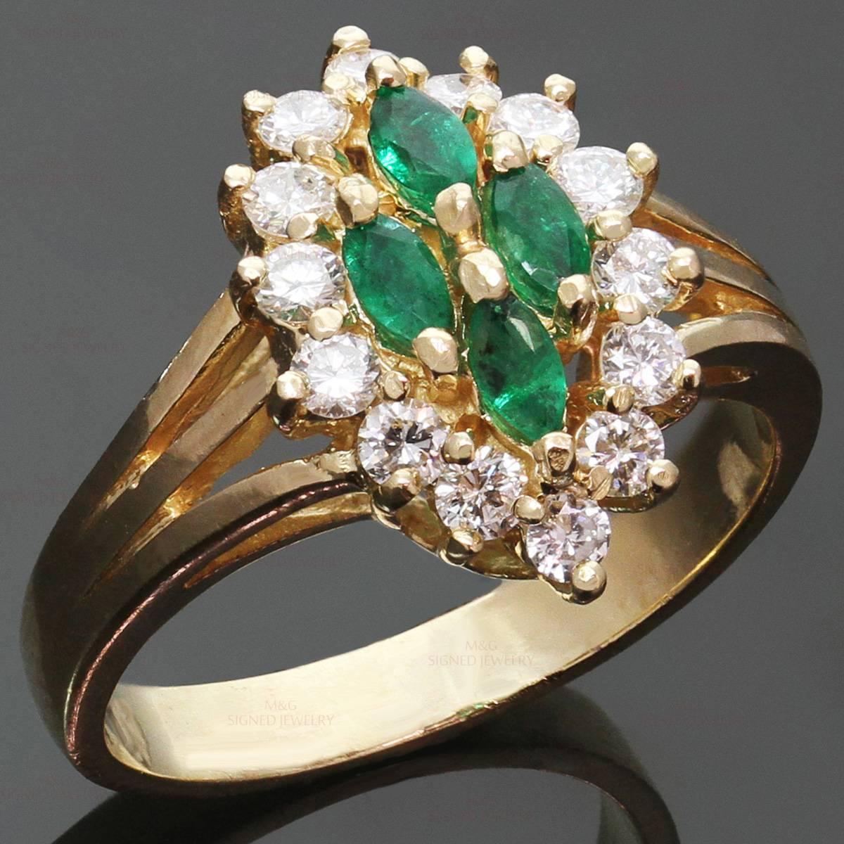 This elegant ring is crafted in 14k yellow gold and set with 4 sparkling marquise-cut emeralds of an estimated 0.40 carats and brilliant-cut round diamonds of an estimated 0.42 carats. Made in United States circa 1990s. Measurements: 0.59