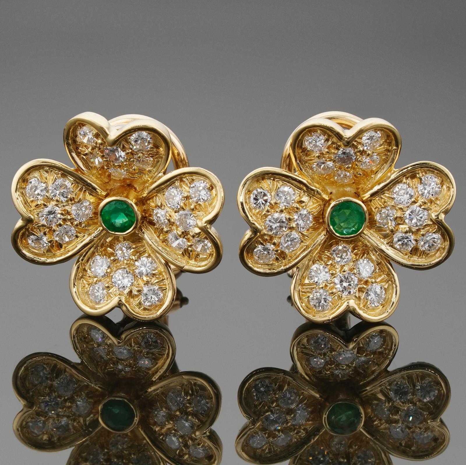 These rare Van Cleef & Arpels lever-back earrings from the gorgeous Frivole collection feature a flower design crafted in 18k yellow gold, prong-set with emeralds in the center, and surrounded with 4 petals pave-set with round brilliant E-F