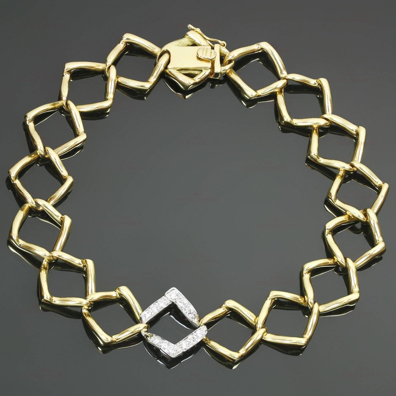 This classic Tiffany bracelet designed by Paloma Picasso features an open link design crafted in 18k yellow gold and accented with a platinum link set with brilliant-cut round diamonds. Made in United States circa 1981. Measurements: 0.47"