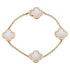 VAN CLEEF & ARPELS : Bracelet « Alhambra 4 » en nacre, motif « 4 », or jaune